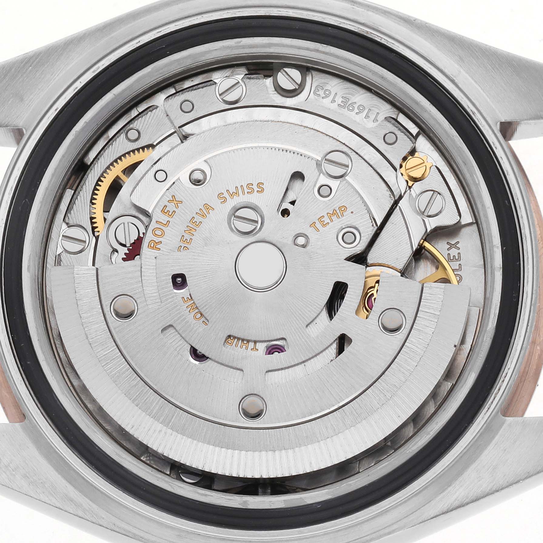 The image shows the internal mechanism of a Rolex Datejust 279171 Women's Steel and Gold (two tone) Pink Dial 279171 Women's Steel and Gold (two tone) Pink Dial, viewed from the back, highlighting its gears and rotor.