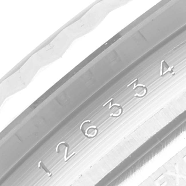 The image shows a close-up of the rehaut with engraved numbers from a Rolex Datejust 41 126334 Men's Stainless Steel Blue Dial.