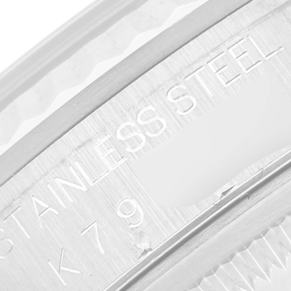 The image shows the inner bezel of a Rolex Datejust 16234 Men's Stainless Steel Blue Dial 16234 Men's Stainless Steel Blue Dial, with "STAINLESS STEEL" engraved on it.