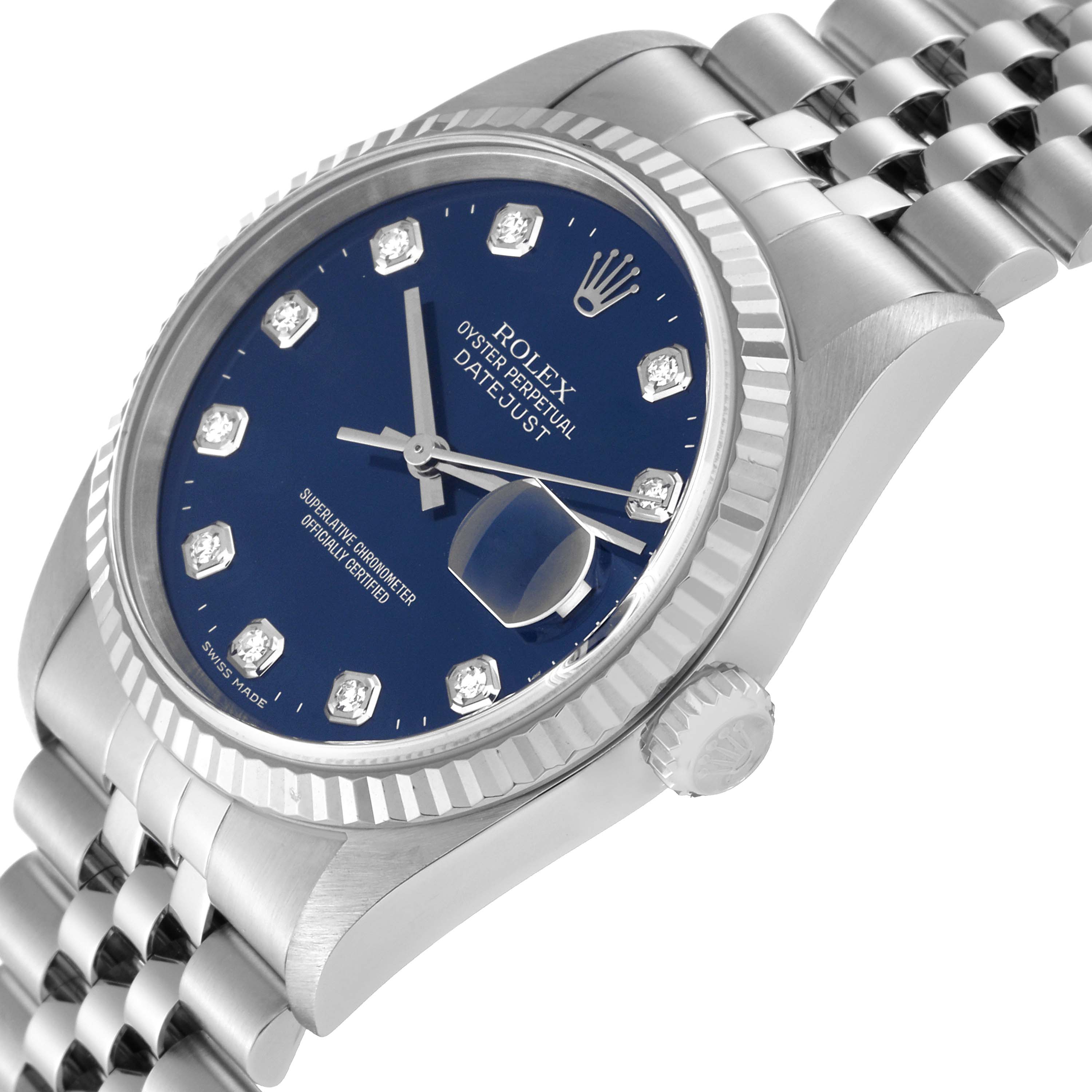 This image shows a Rolex Datejust 16234 Men's Stainless Steel Blue Dial 16234 Men's Stainless Steel Blue Dial watch at a slight side angle, highlighting its blue dial, diamond markers, fluted bezel, and Jubilee bracelet.