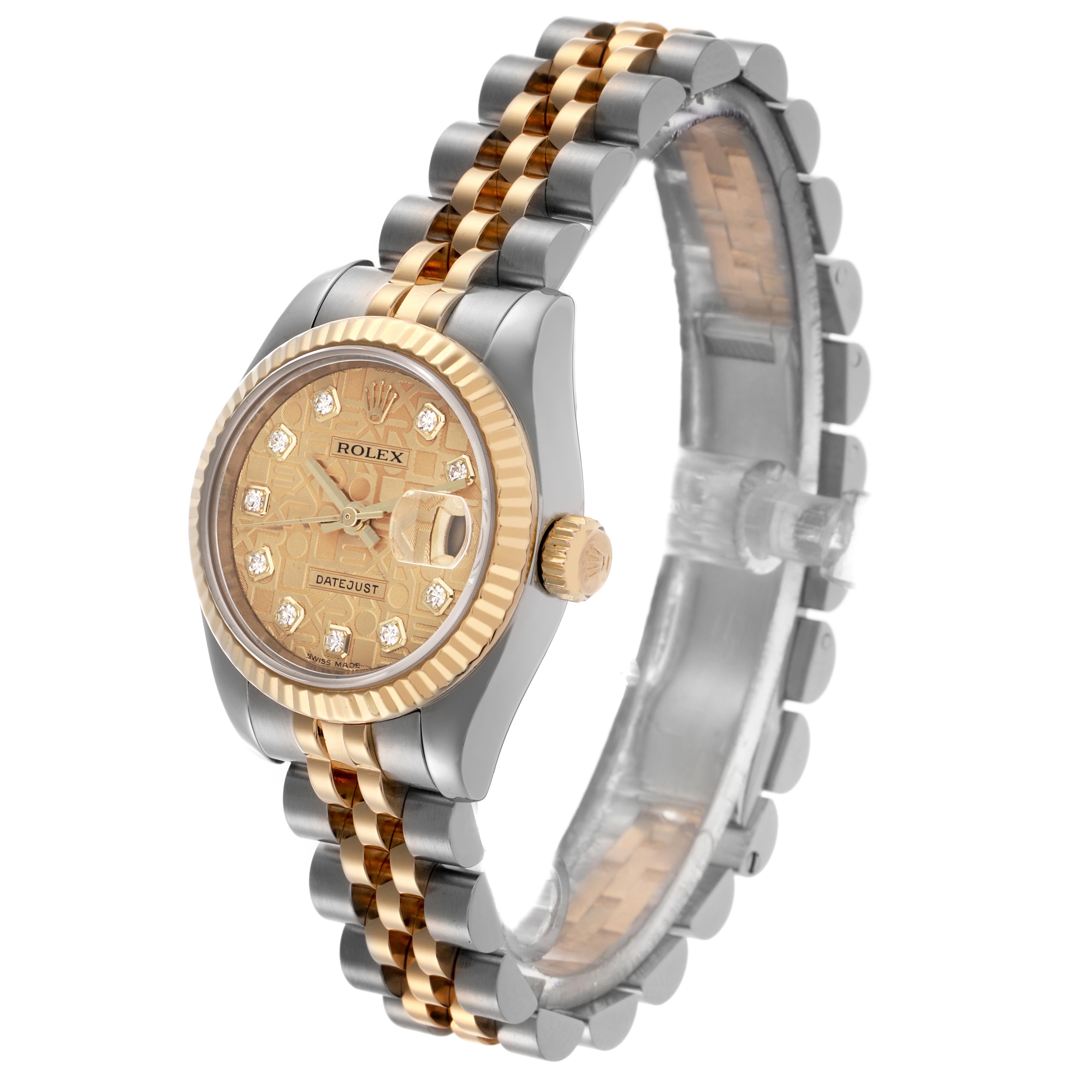 The Rolex Datejust 179173 Women's Steel and Gold (two tone) Champagne Dial 179173 Women's Steel and Gold (two tone) Champagne Dial watch is shown from a 3/4 side angle, highlighting the dial, bezel, crown, and two-tone bracelet.