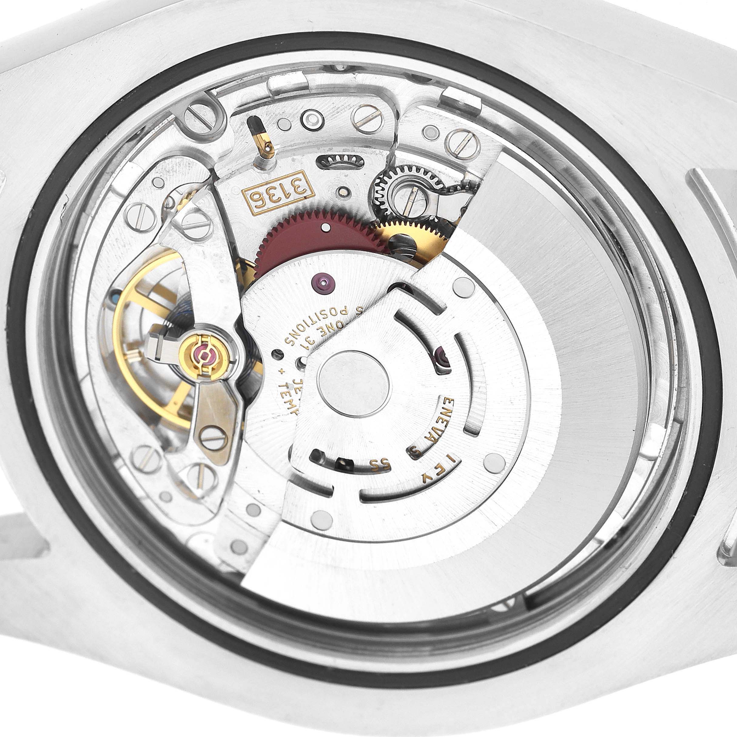 This image shows the movement of a Rolex Datejust 41 116300 Men's Stainless Steel Silver Dial from the back, highlighting its intricate mechanical parts.