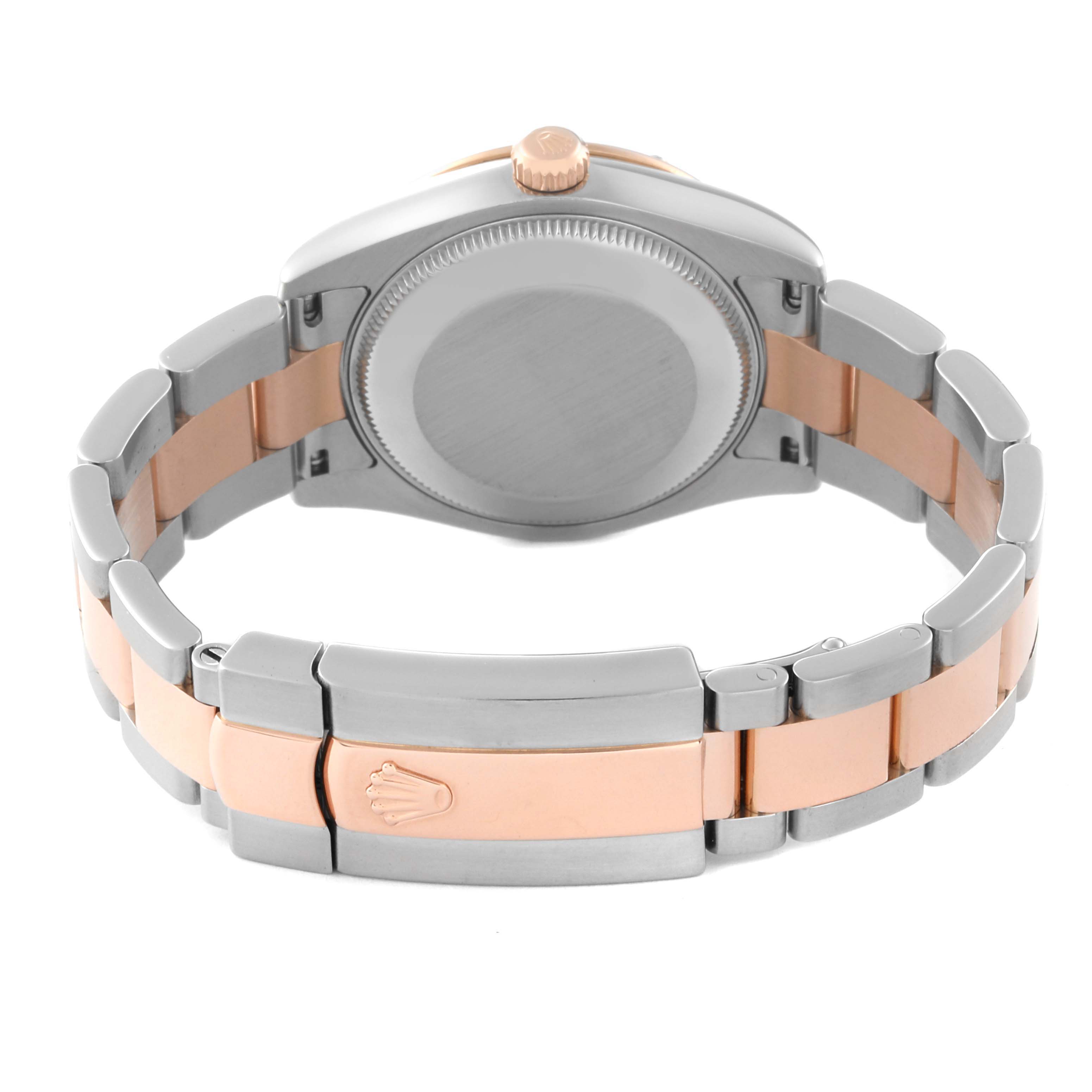 The image shows the back view of a Rolex Mid-Size 178341 Women's Steel and Gold (two tone) Pink Dial 178341 Women's Steel and Gold (two tone) Pink Dial watch, highlighting the case back and the two-tone bracelet with the clasp.