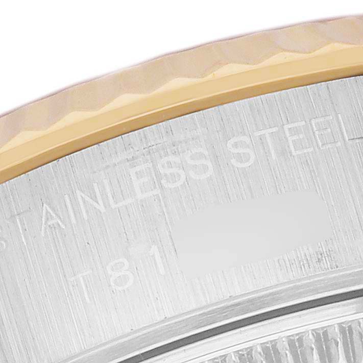 This close-up image shows the stainless steel and gold fluted bezel of a Rolex Datejust 69173 Women's Steel and Gold (two tone) Mother of Pearl Dial 69173 Women's Steel and Gold (two tone) Mother of Pearl Dial watch.