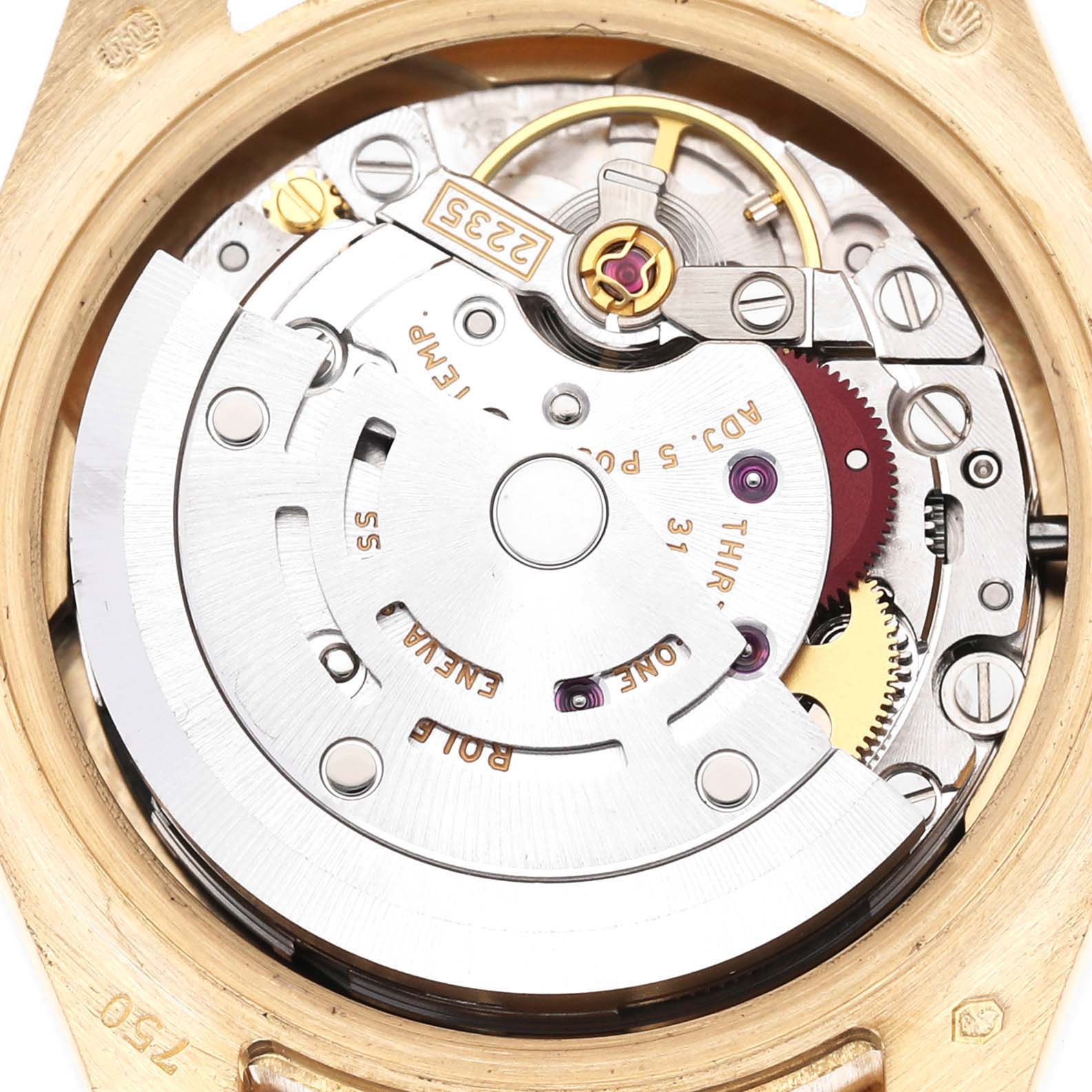 This image shows a close-up of the internal mechanics and movement of a Rolex President 179138 Women's Yellow Gold Black Dial 179138 Women's Yellow Gold Black Dial model watch.