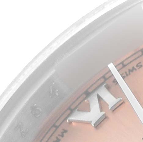 This image shows a close-up angle of the dial and metallic hour marker of a Rolex Datejust 179160 Women's Stainless Steel Pink Dial 179160 Women's Stainless Steel Pink Dial watch.