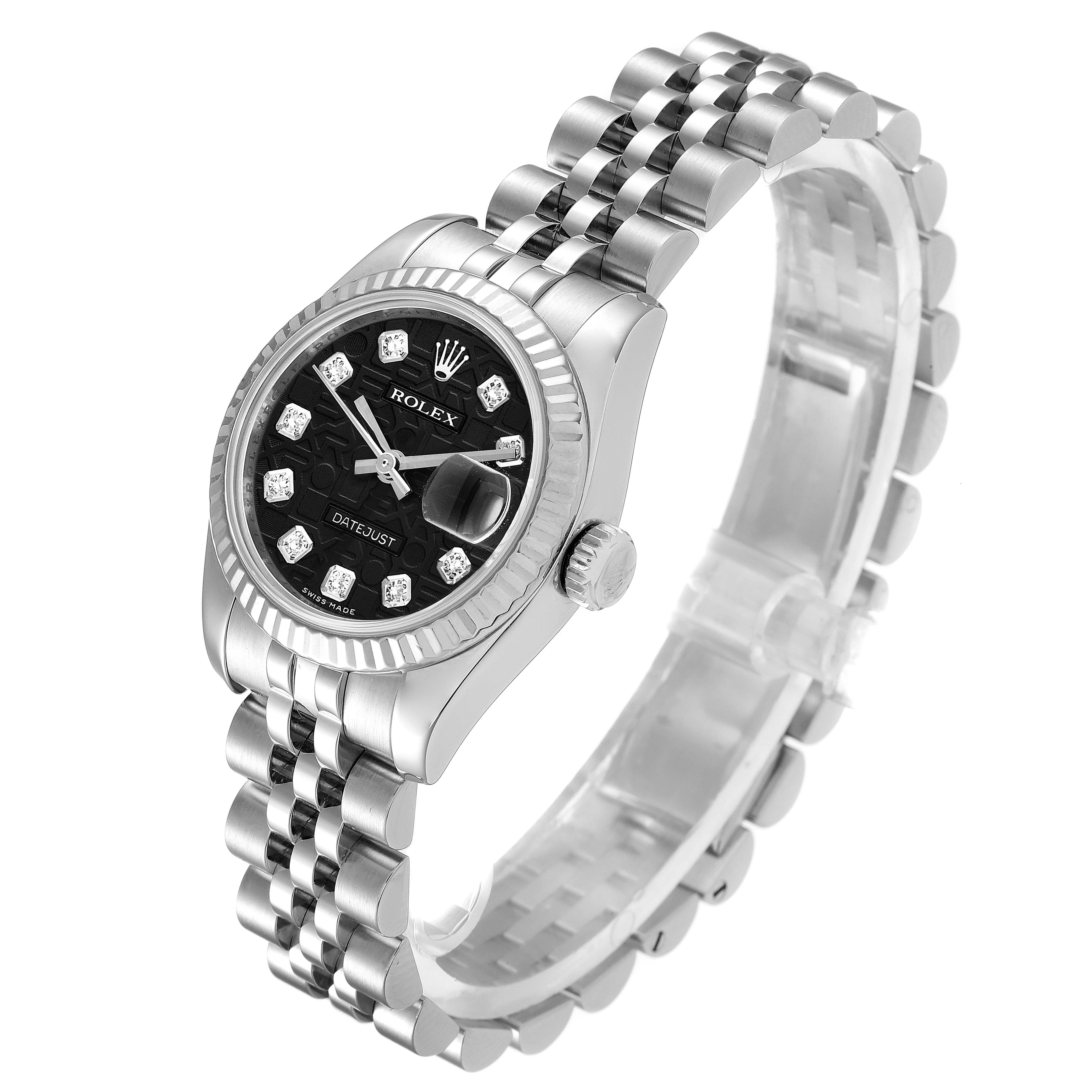 The image shows a Rolex Datejust 179174 Women's Stainless Steel Black Dial 179174 Women's Stainless Steel Black Dial watch, highlighting its bracelet, bezel, dial, and crown at an angled view.