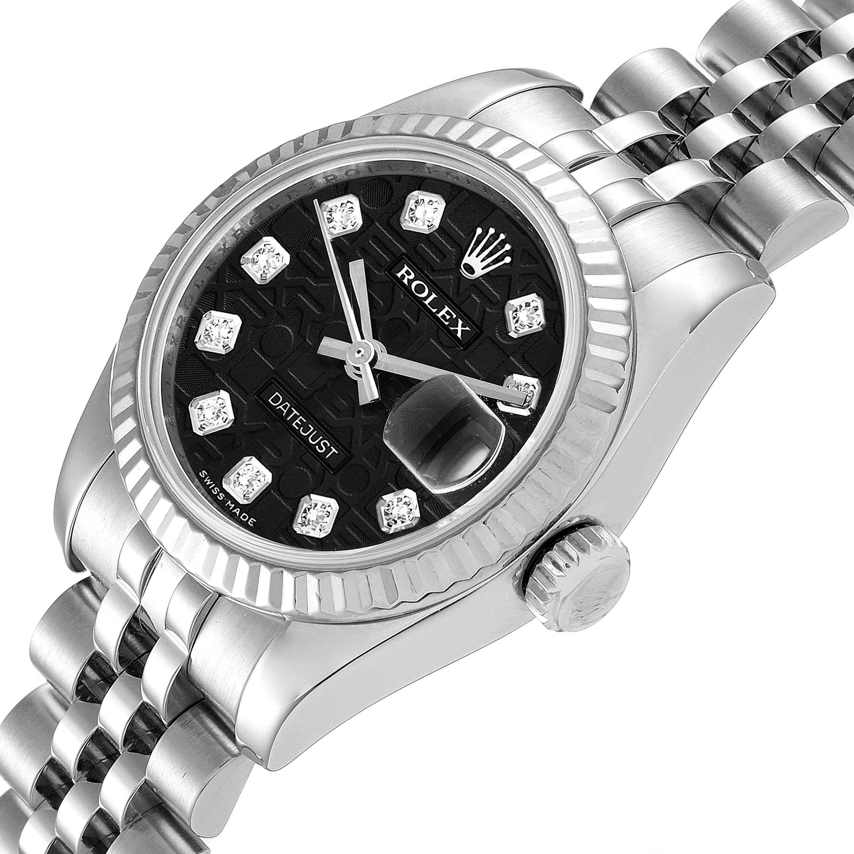 This image shows a Rolex Datejust 179174 Women's Stainless Steel Black Dial 179174 Women's Stainless Steel Black Dial watch at a slight angle, highlighting the bezel, dial, crown, and a portion of the bracelet.