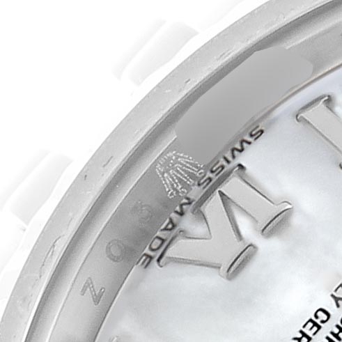 The image shows a close-up of the dial edge of a Rolex Datejust 179174 Women's Stainless Steel Mother of Pearl Dial 179174 Women's Stainless Steel Mother of Pearl Dial, highlighting the Roman numeral markers and part of the bezel.