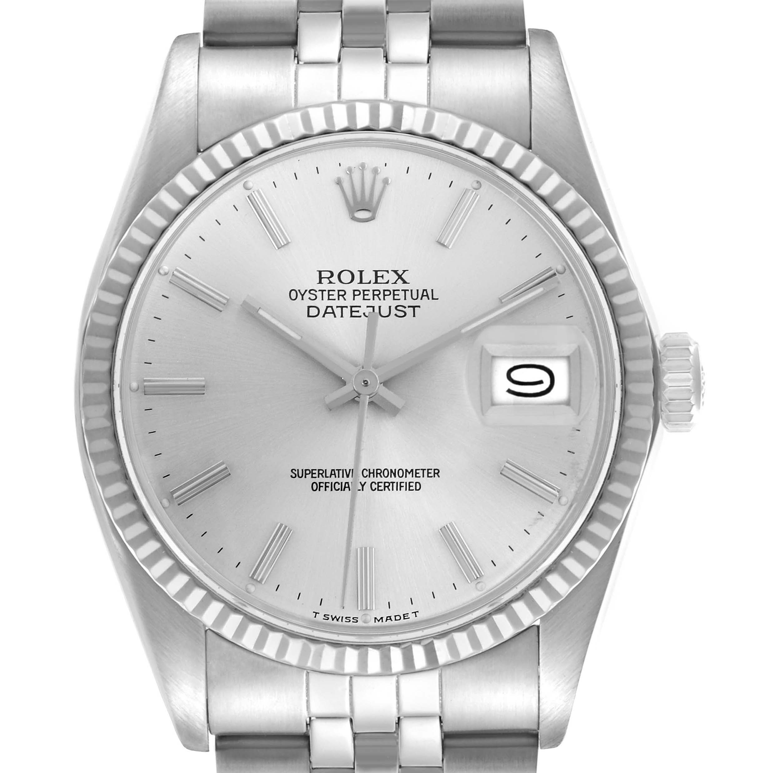 The Rolex Datejust 16014 Men's Stainless Steel Silver Dial 16014 Men's Stainless Steel Silver Dial watch is shown from a direct front angle, highlighting its dial, bezel, and part of the bracelet.
