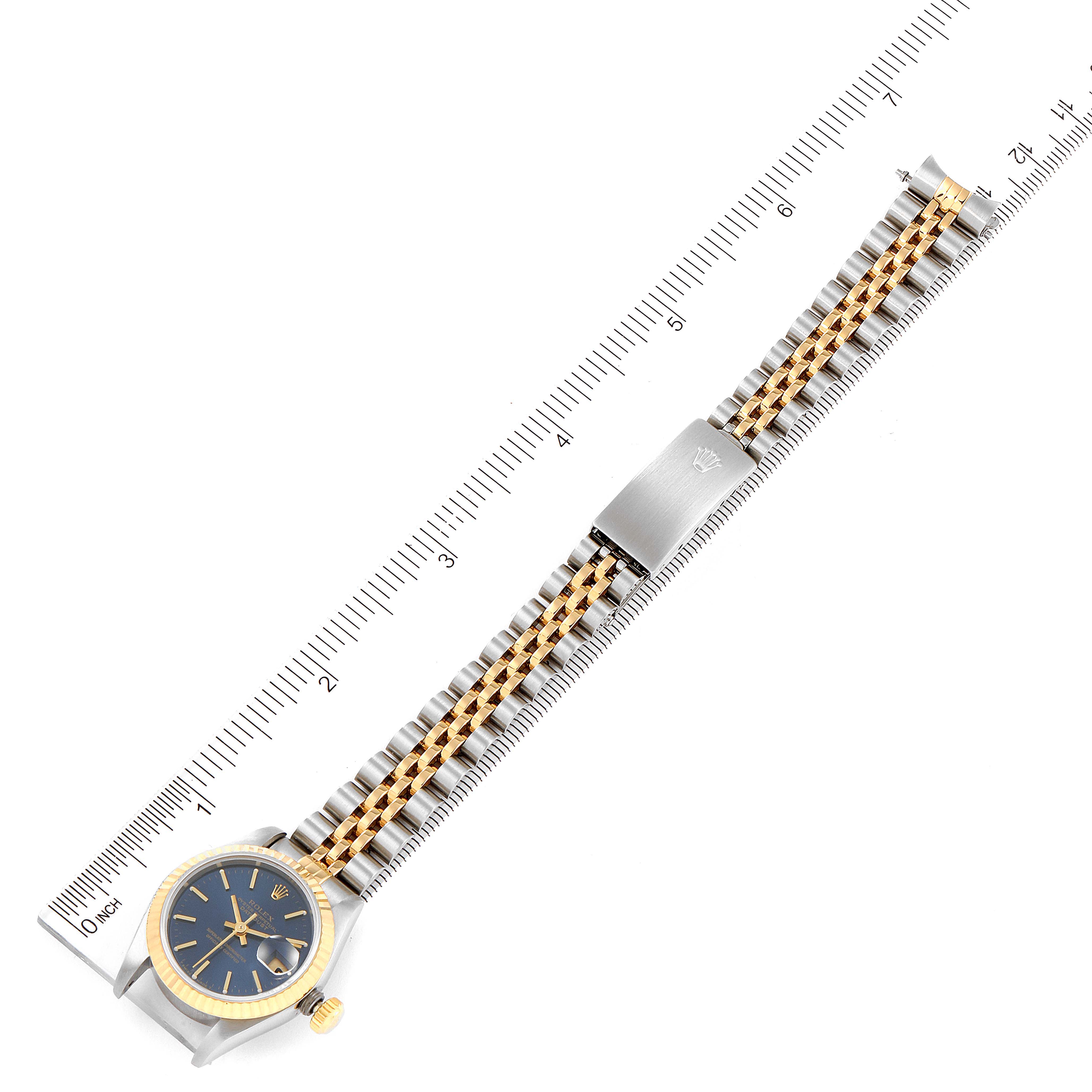The image shows a top view of a Rolex Datejust 69173 Women's Steel and Gold (two tone) Blue Dial 69173 Women's Steel and Gold (two tone) Blue Dial watch, including the dial, bezel, crown, bracelet, and clasp.