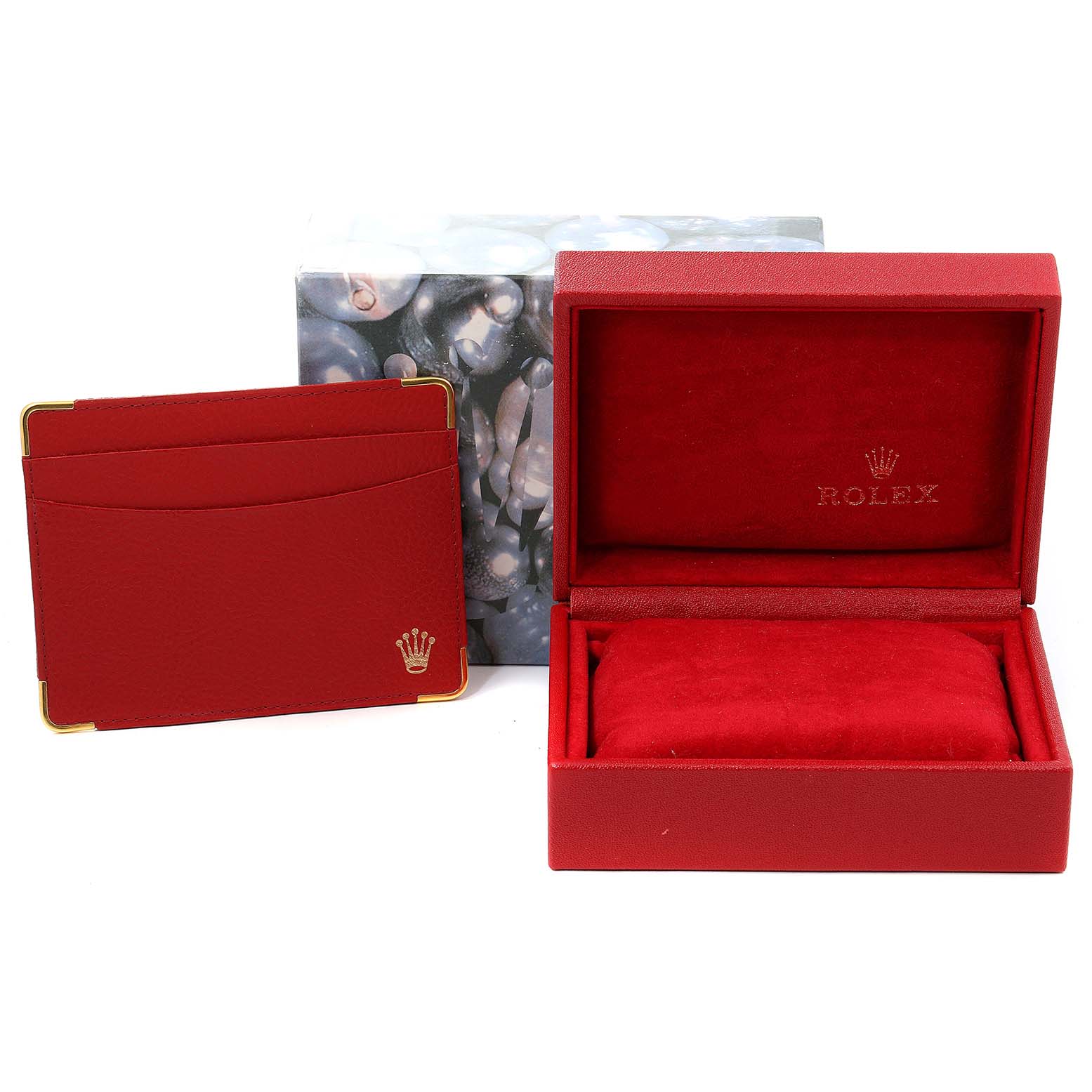 The image shows a Rolex Datejust 79173 Women's Steel and Gold (two tone) Blue Dial 79173 Women's Steel and Gold (two tone) Blue Dial watch box and cardholder in red with gold accents.