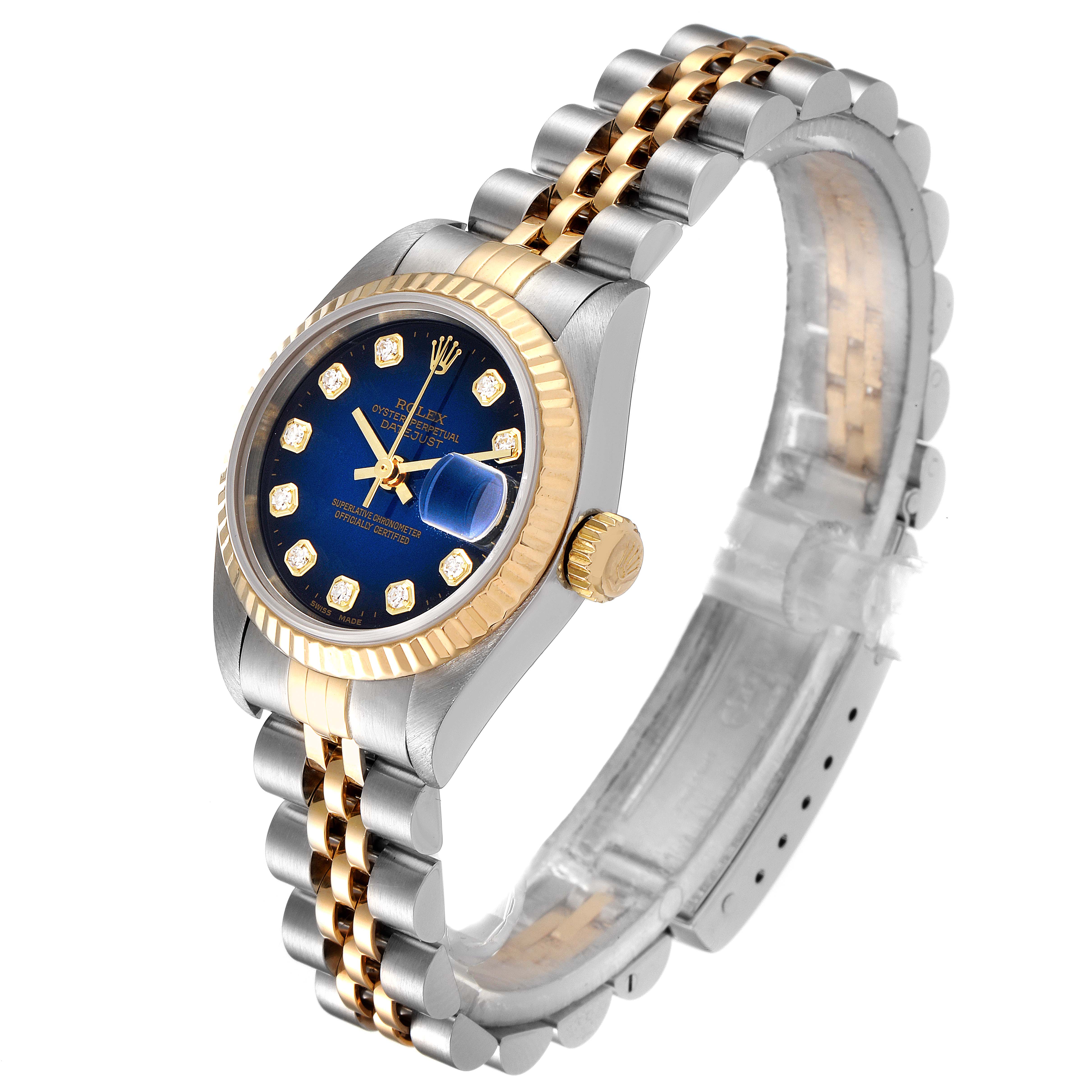 This image shows the Rolex Datejust 79173 Women's Steel and Gold (two tone) Blue Dial 79173 Women's Steel and Gold (two tone) Blue Dial watch at an angled view, highlighting the dial, bezel, crown, and two-tone Jubilee bracelet.