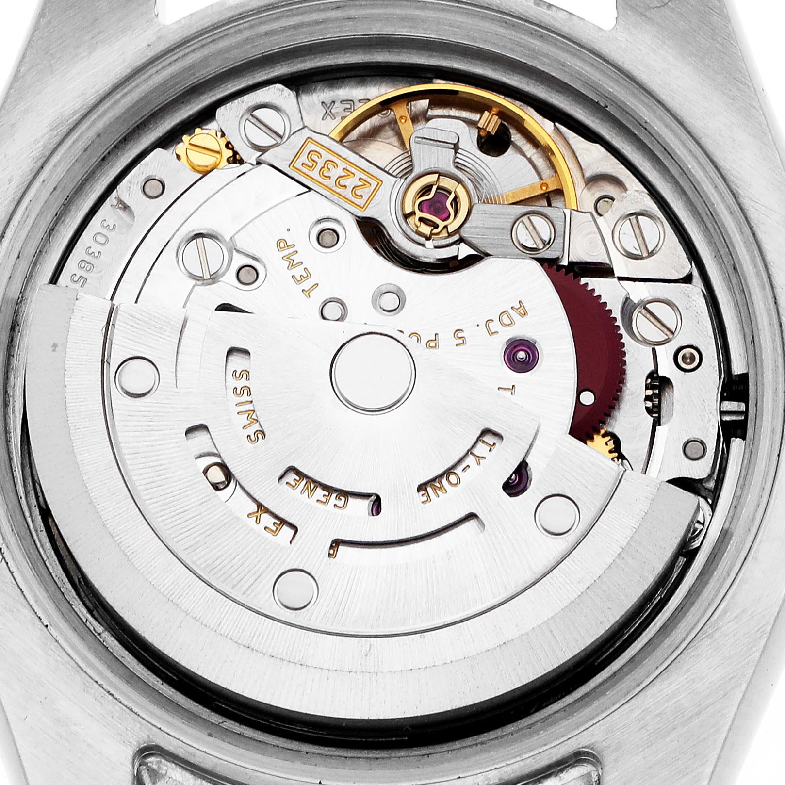 The image shows the movement of a Rolex Datejust 179173 Women's Steel and Gold (two tone) White Dial 179173 Women's Steel and Gold (two tone) White Dial watch from a top-down angle, highlighting gears and inner mechanisms.