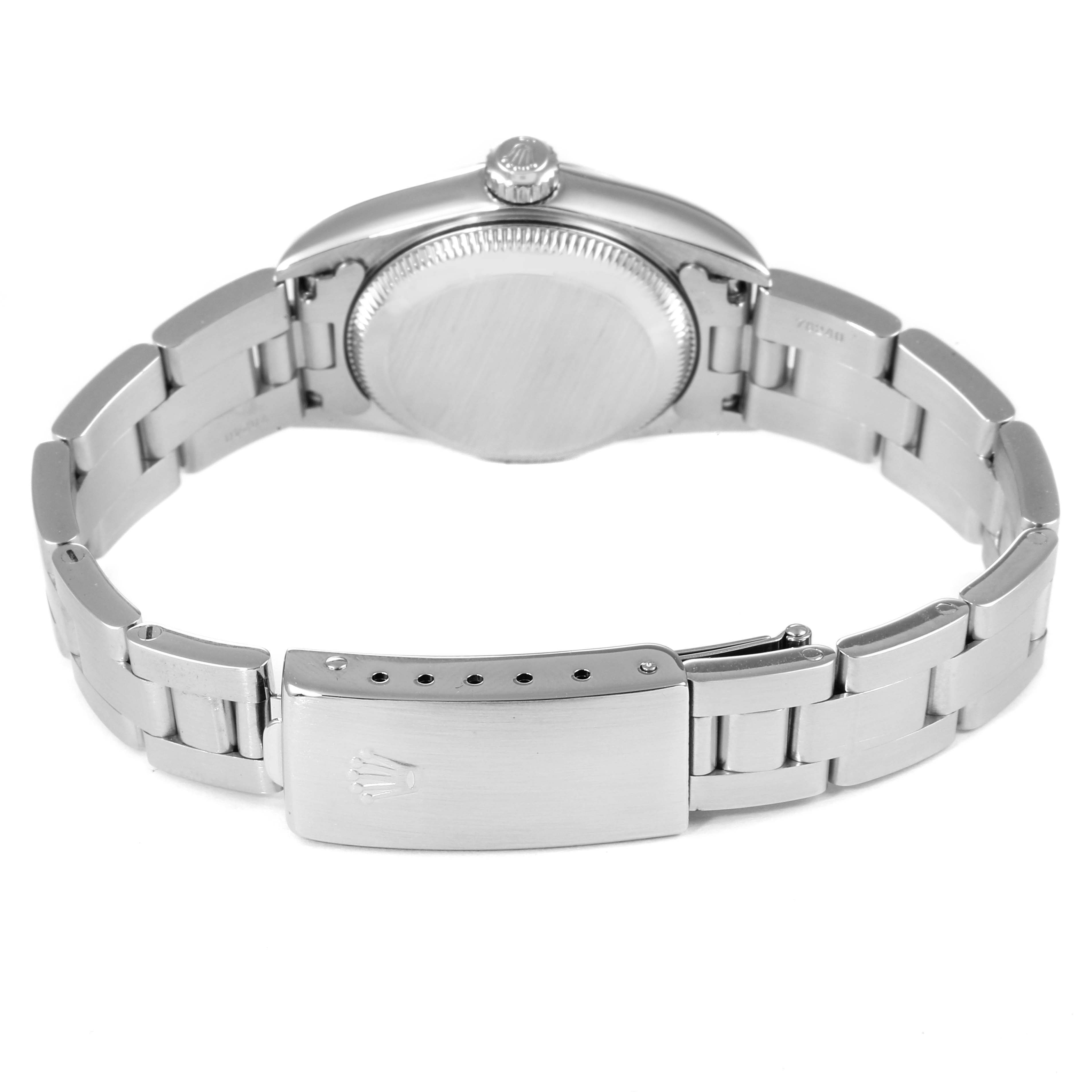 The image shows the back view of a Rolex Oyster Perpetual 76080 Women's Stainless Steel White Dial 76080 Women's Stainless Steel White Dial watch, highlighting its bracelet and clasp.