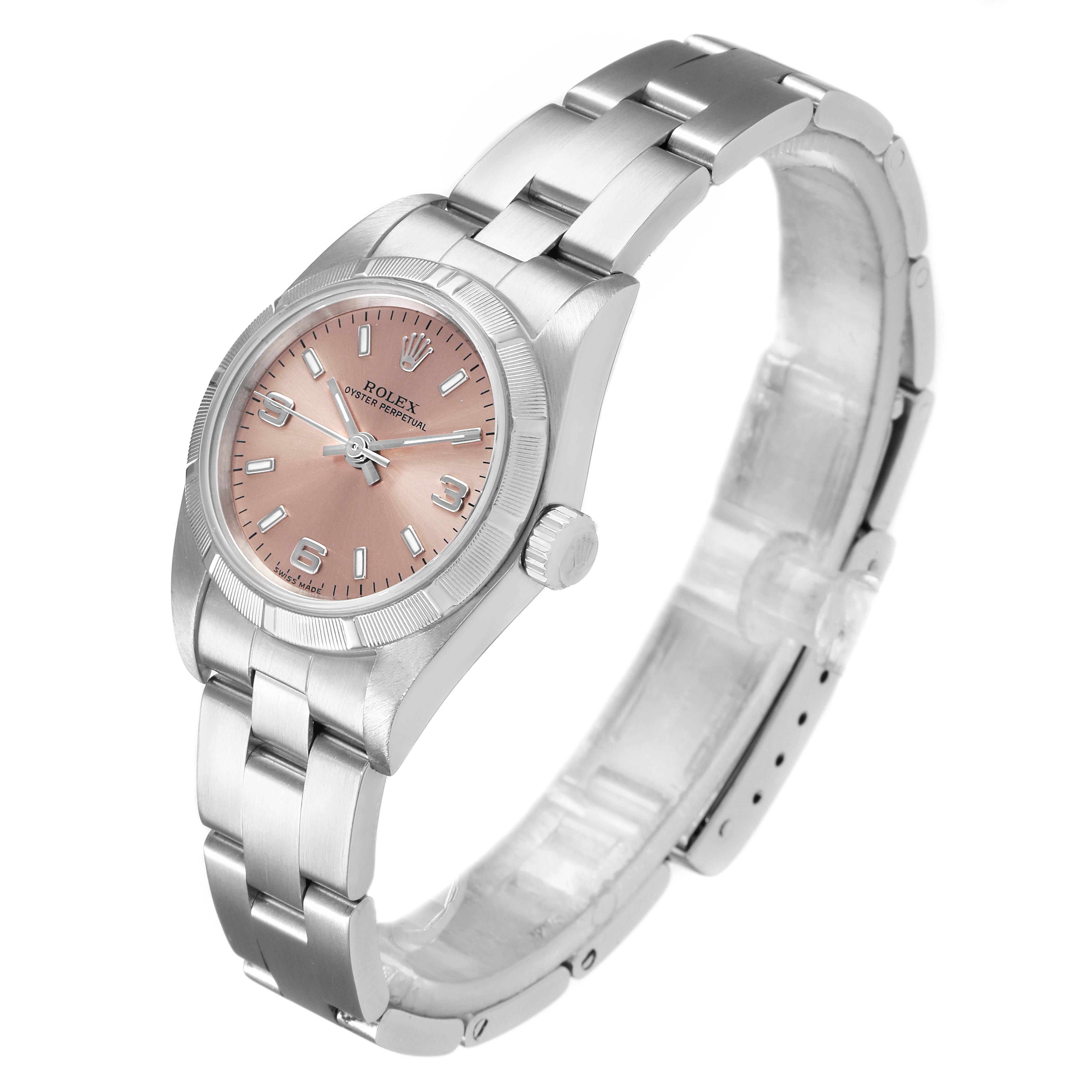 The Rolex Oyster Perpetual 76030 Women's Stainless Steel Pink Dial 76030 Women's Stainless Steel Pink Dial watch is shown at a slight angle displaying the face, bezel, case, crown, and bracelet.
