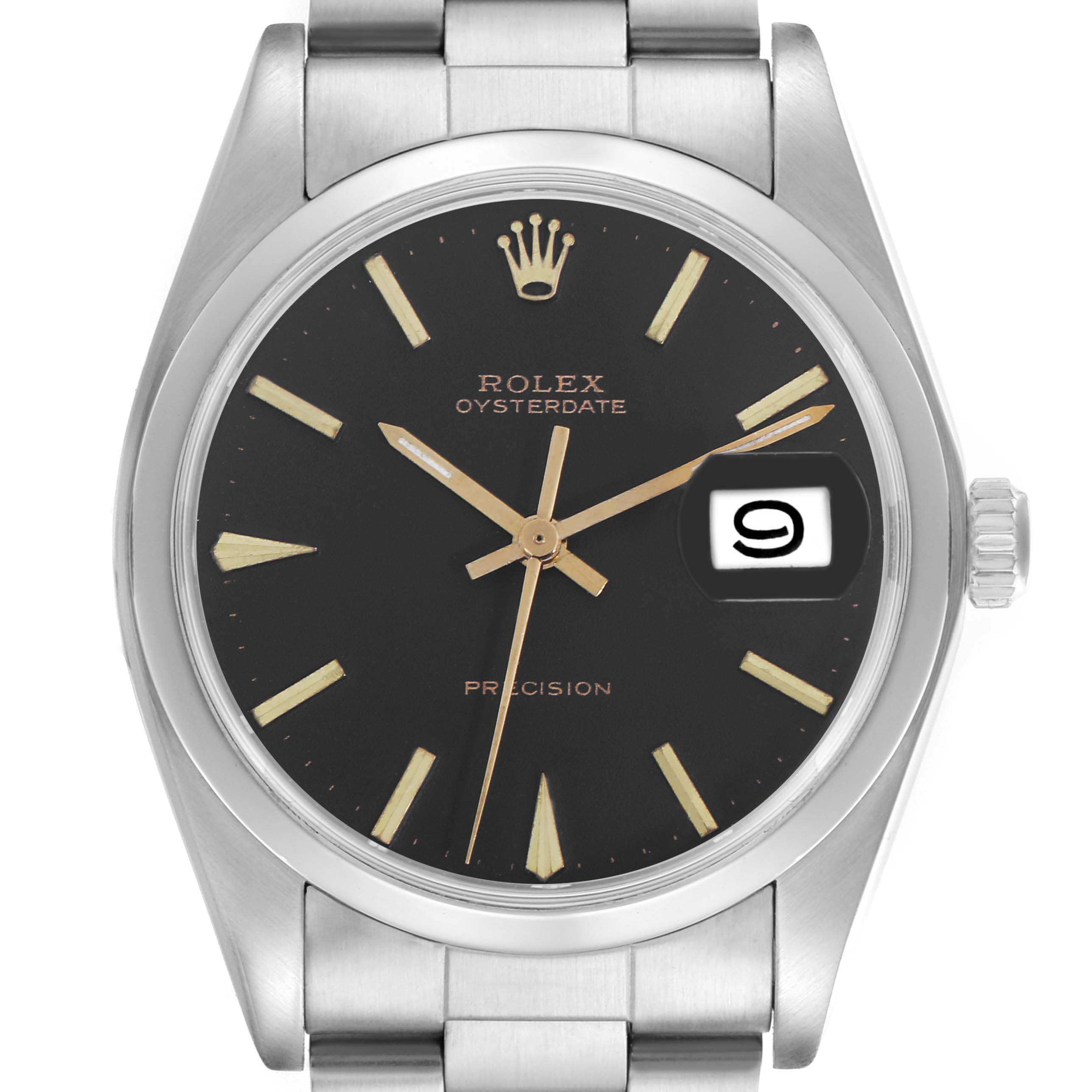 The Rolex Date watch is shown from a front angle, highlighting the dial, hands, crown, and date window.