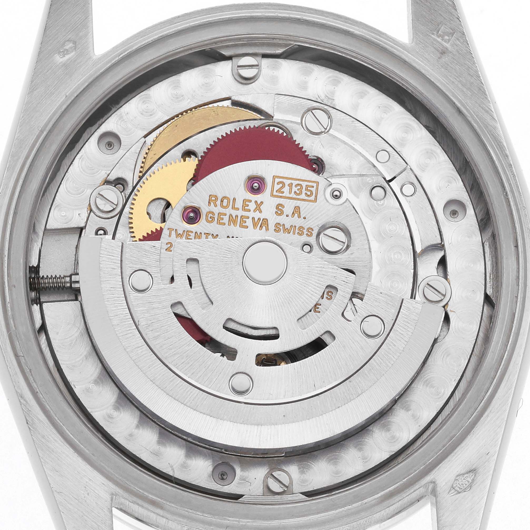 The image shows the movement of a Rolex Mid-Size model from a top view, highlighting gears and the rotor.