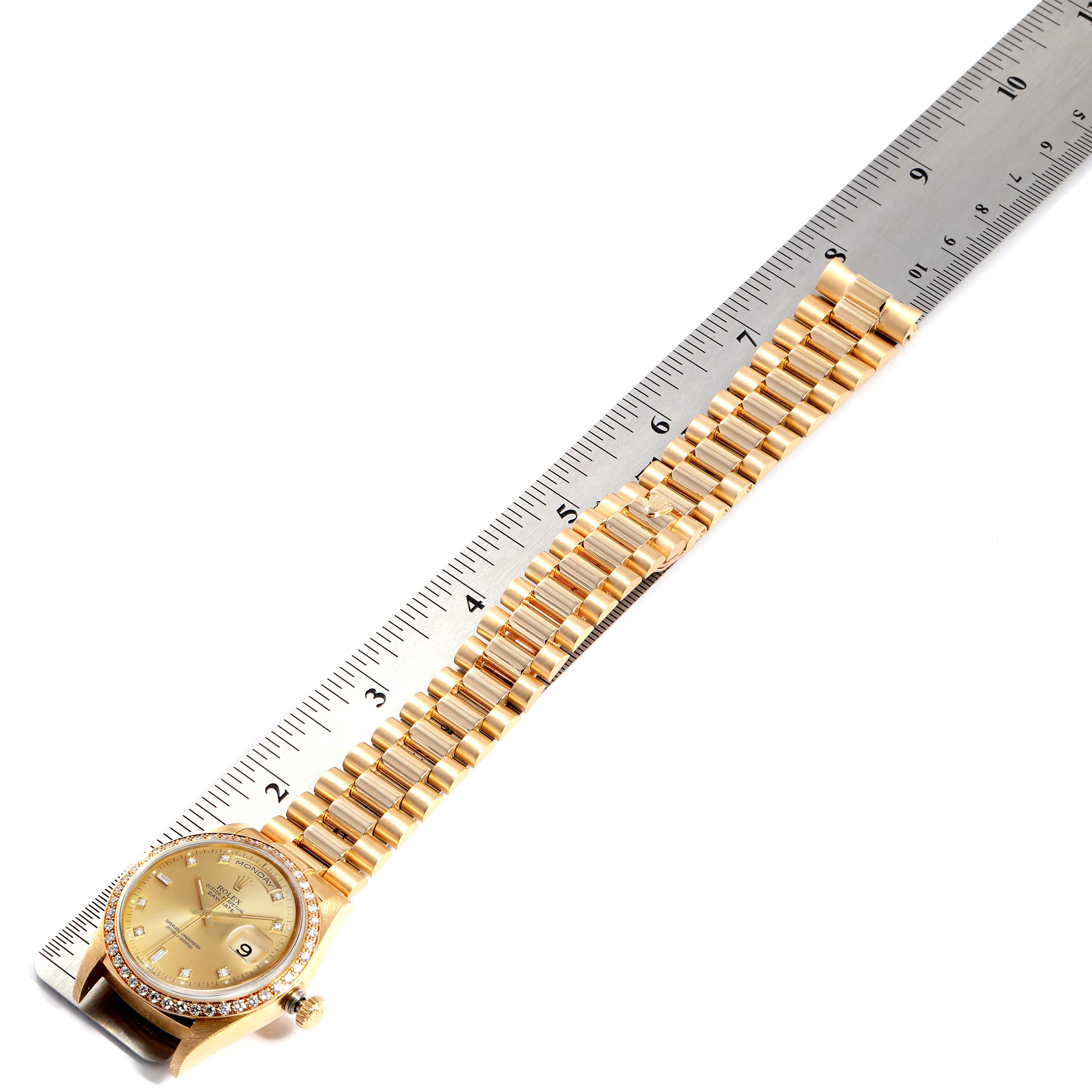 The image shows the face and bracelet of the Rolex President 18038 Men's Yellow Gold Champagne Dial 18038 Men's Yellow Gold Champagne Dial model watch from a top-down angle alongside a ruler.
