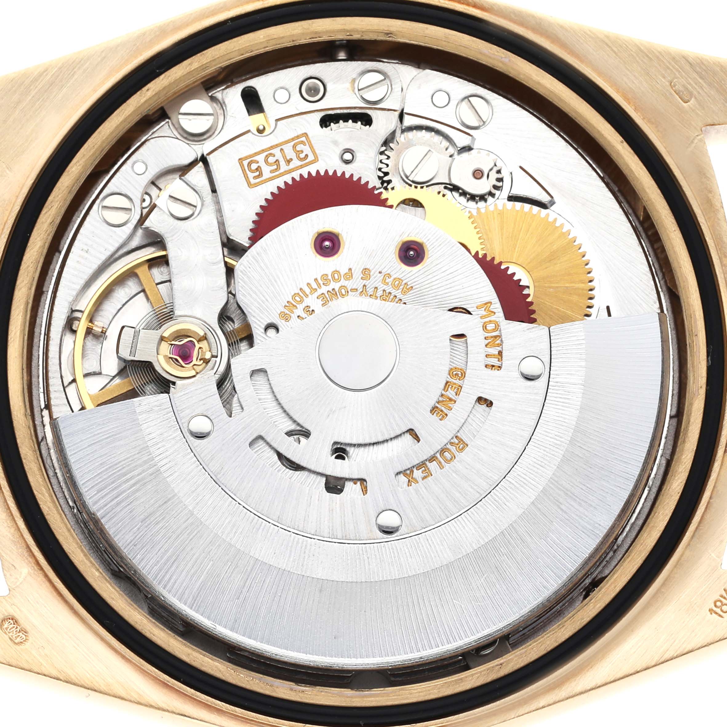 The image shows the back view of the Rolex President 18238 Men's Yellow Gold Champagne Dial 18238 Men's Yellow Gold Champagne Dial watch, highlighting its intricate movement and gears.