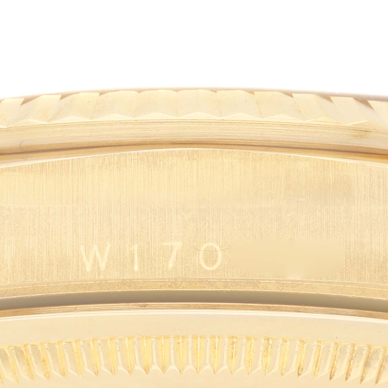 The image shows a close-up of the side of the Rolex President 18238 Men's Yellow Gold Champagne Dial 18238 Men's Yellow Gold Champagne Dial watch, highlighting the case and edge details.