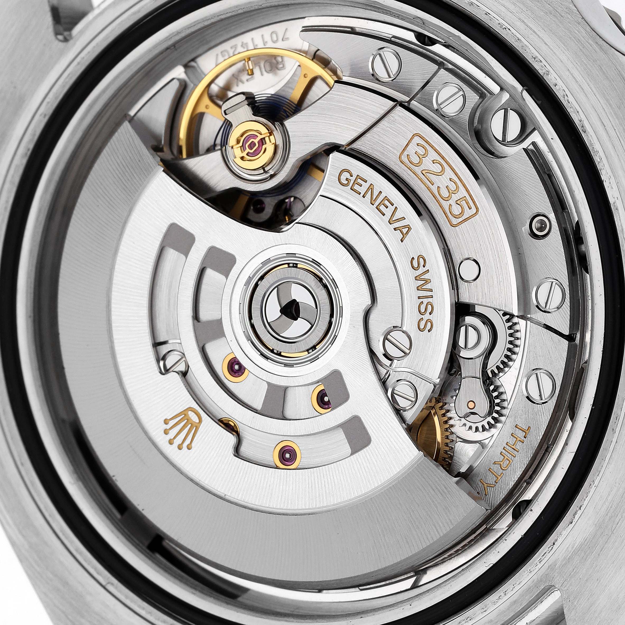 This image shows a close-up view of the movement mechanism inside a Rolex Submariner 126610LN Men
s Stainless Steel Black Dial 126610LN Men
s Stainless Steel Black Dial watch.