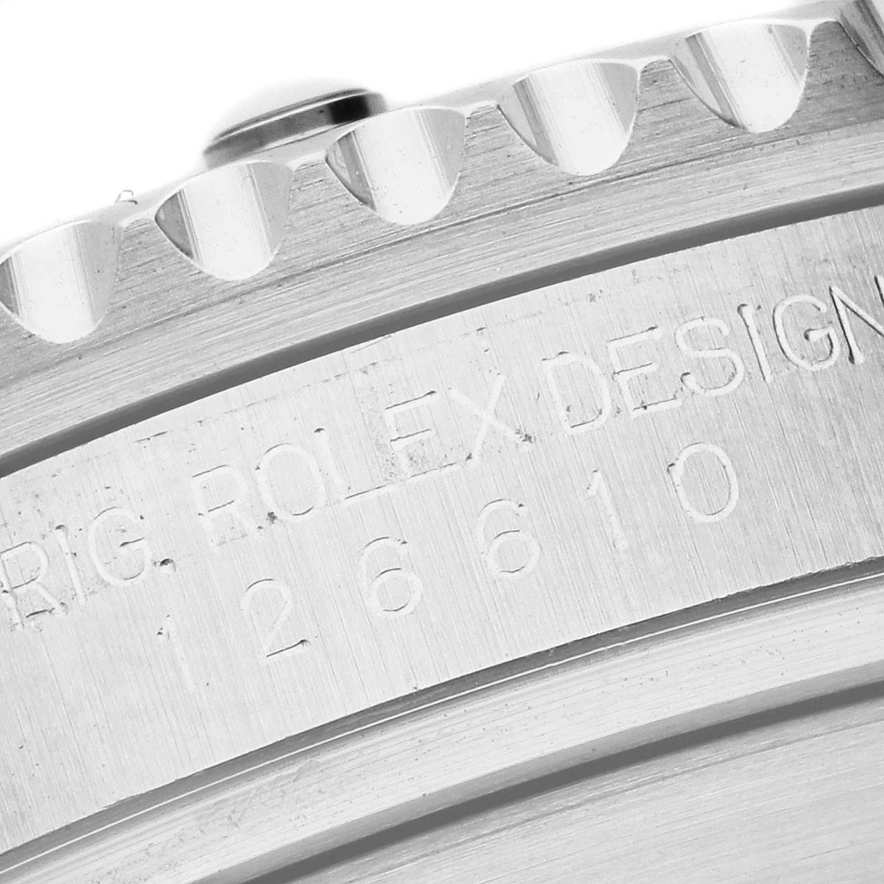 The image shows a close-up of the engraved bezel and part of the case of a Rolex Submariner 126610LN Men
s Stainless Steel Black Dial 126610LN Men
s Stainless Steel Black Dial watch.