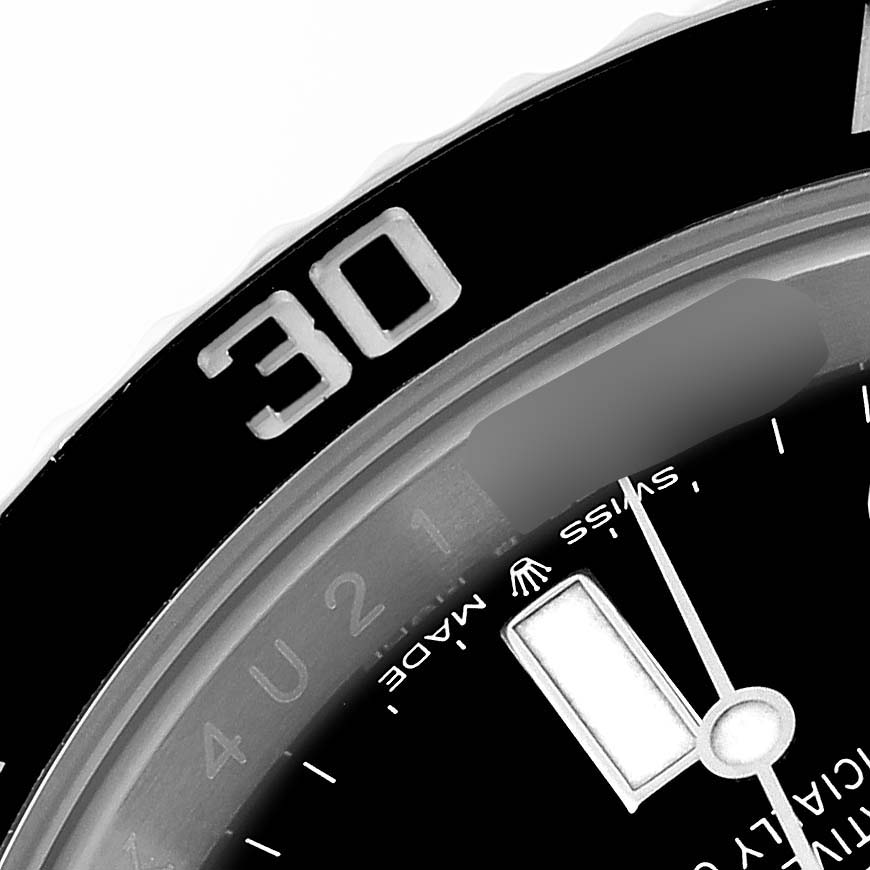 The image shows a close-up of the bezel and partial dial of a Rolex Submariner 126610LN Men
s Stainless Steel Black Dial 126610LN Men
s Stainless Steel Black Dial, displaying the "30" minute mark.
