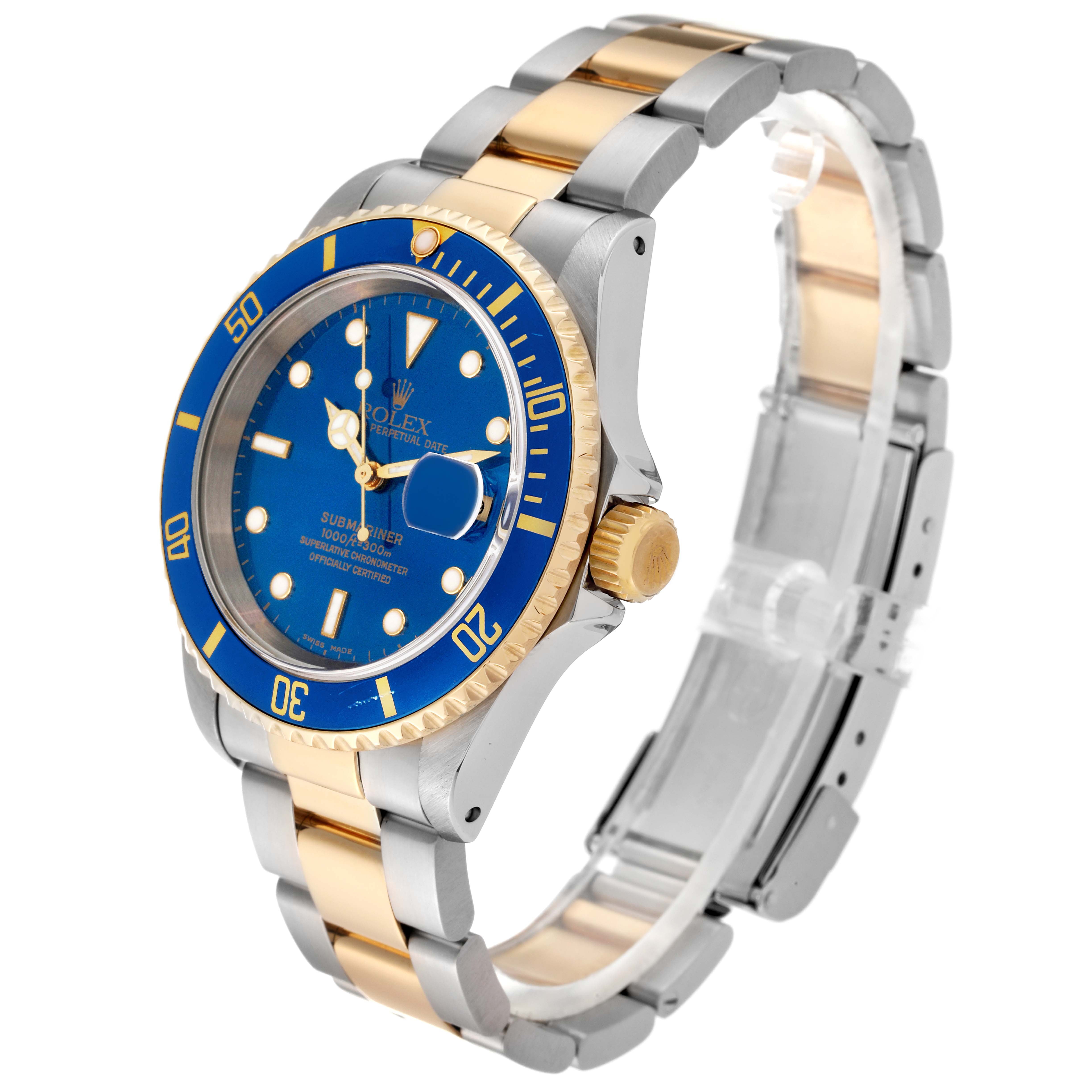 The Rolex Submariner 16613 Men's Steel and Gold (two tone) Blue Dial 16613 Men's Steel and Gold (two tone) Blue Dial watch is shown at an angle, highlighting its blue dial, bezel, two-tone band, and crown.