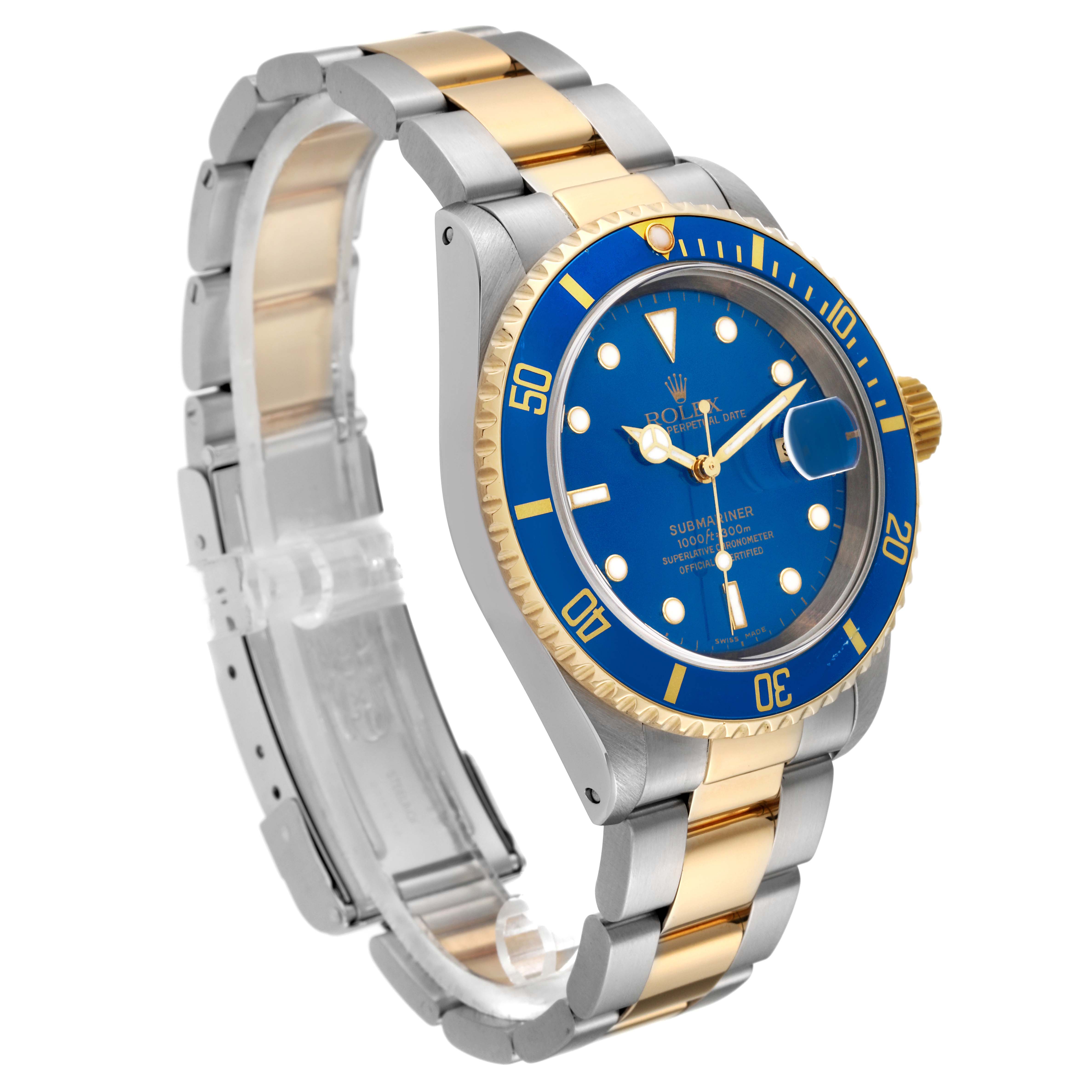 The image shows a Rolex Submariner 16613 Men's Steel and Gold (two tone) Blue Dial 16613 Men's Steel and Gold (two tone) Blue Dial watch at a three-quarters angle, highlighting its blue dial, bezel, and gold and silver bracelet.