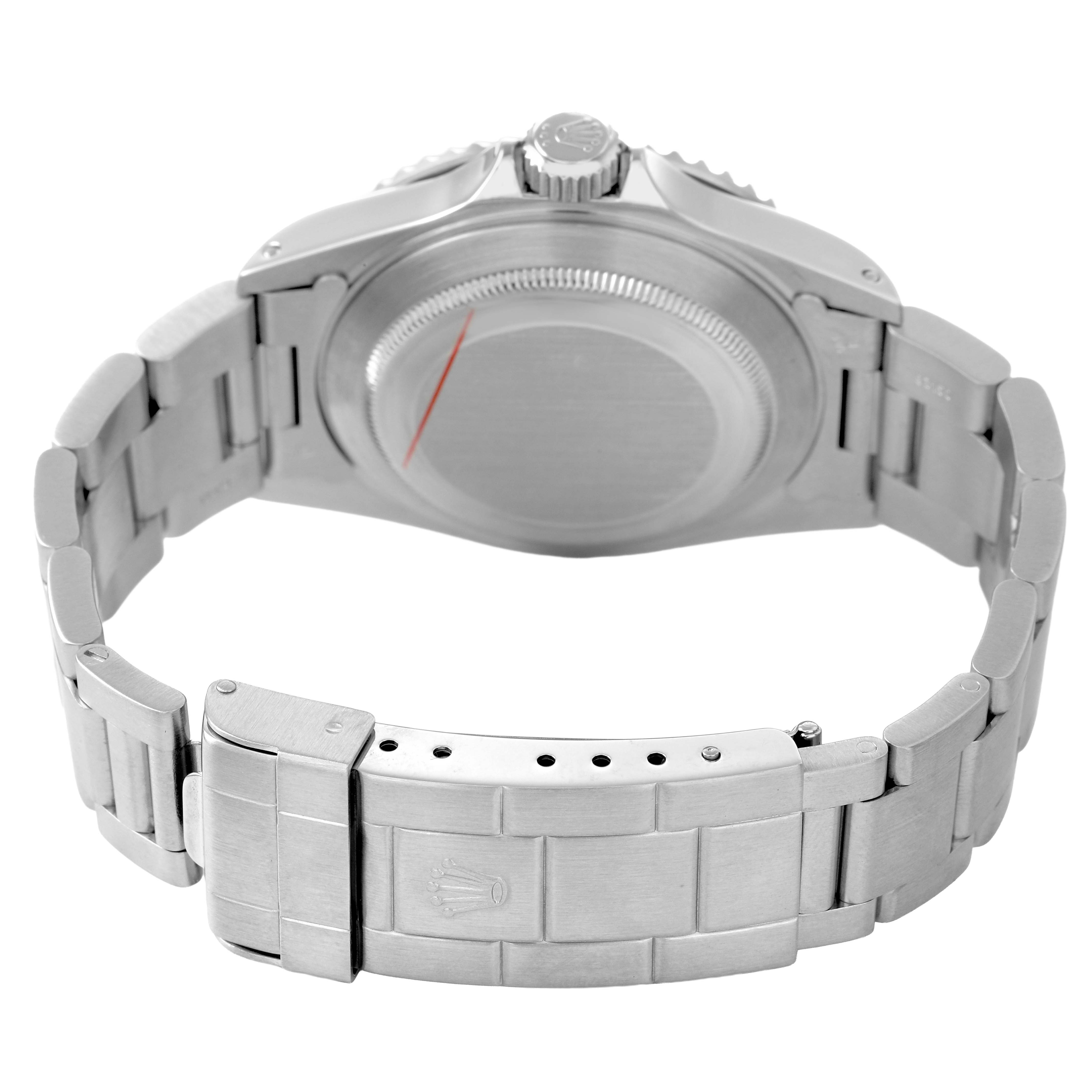 The Rolex Submariner 14060M Men's Stainless Steel Black Dial watch is shown from the back, featuring the case back, bracelet, and clasp.