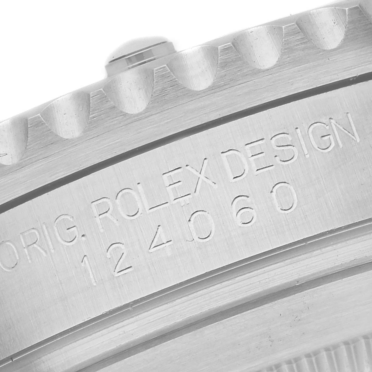 This image shows a close-up of the engraving on the side of the Rolex Submariner 124060 Men
s Stainless Steel Black Dial 124060 Men
s Stainless Steel Black Dial watch case.