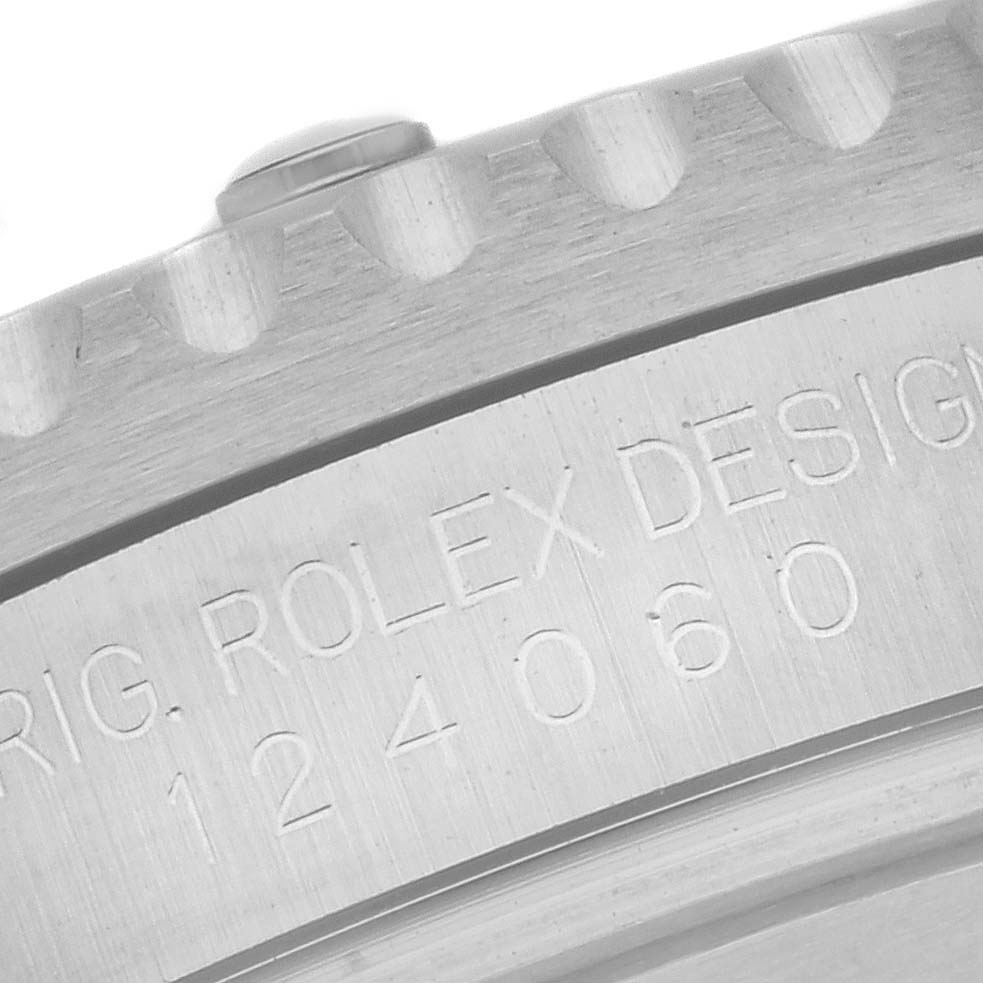 This close-up image showcases the side view of a Rolex Submariner 124060 Men
s Stainless Steel Black Dial 124060 Men
s Stainless Steel Black Dial watch, highlighting the engraved bezel and part of the case.