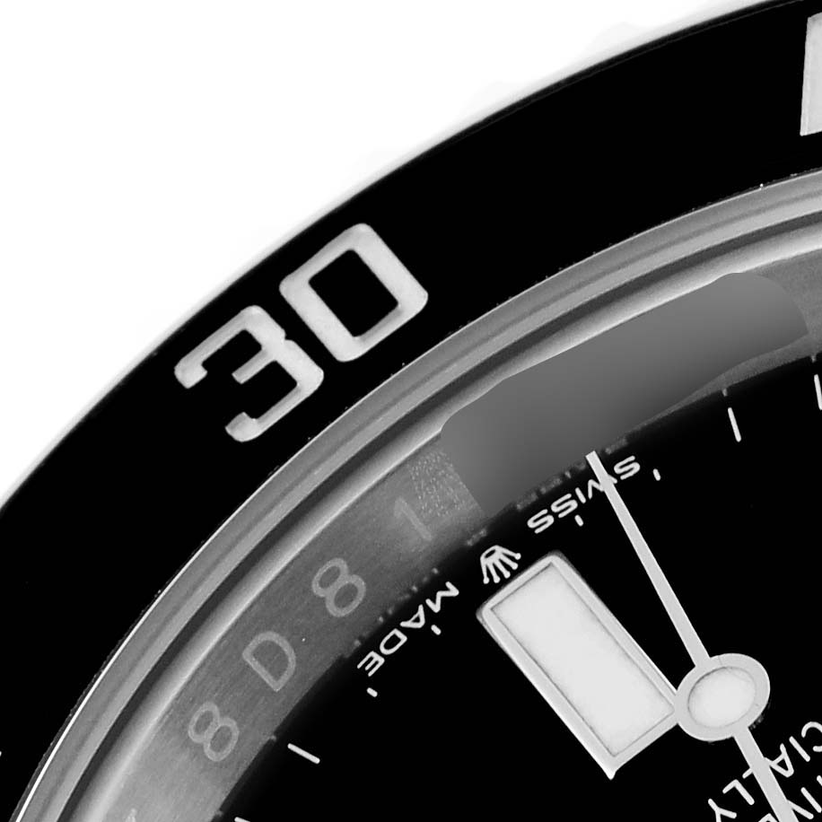 Close-up of the bezel and part of the dial of a Rolex Submariner 124060 Men
s Stainless Steel Black Dial 124060 Men
s Stainless Steel Black Dial watch, showing the "30" marking and "Swiss Made" text.