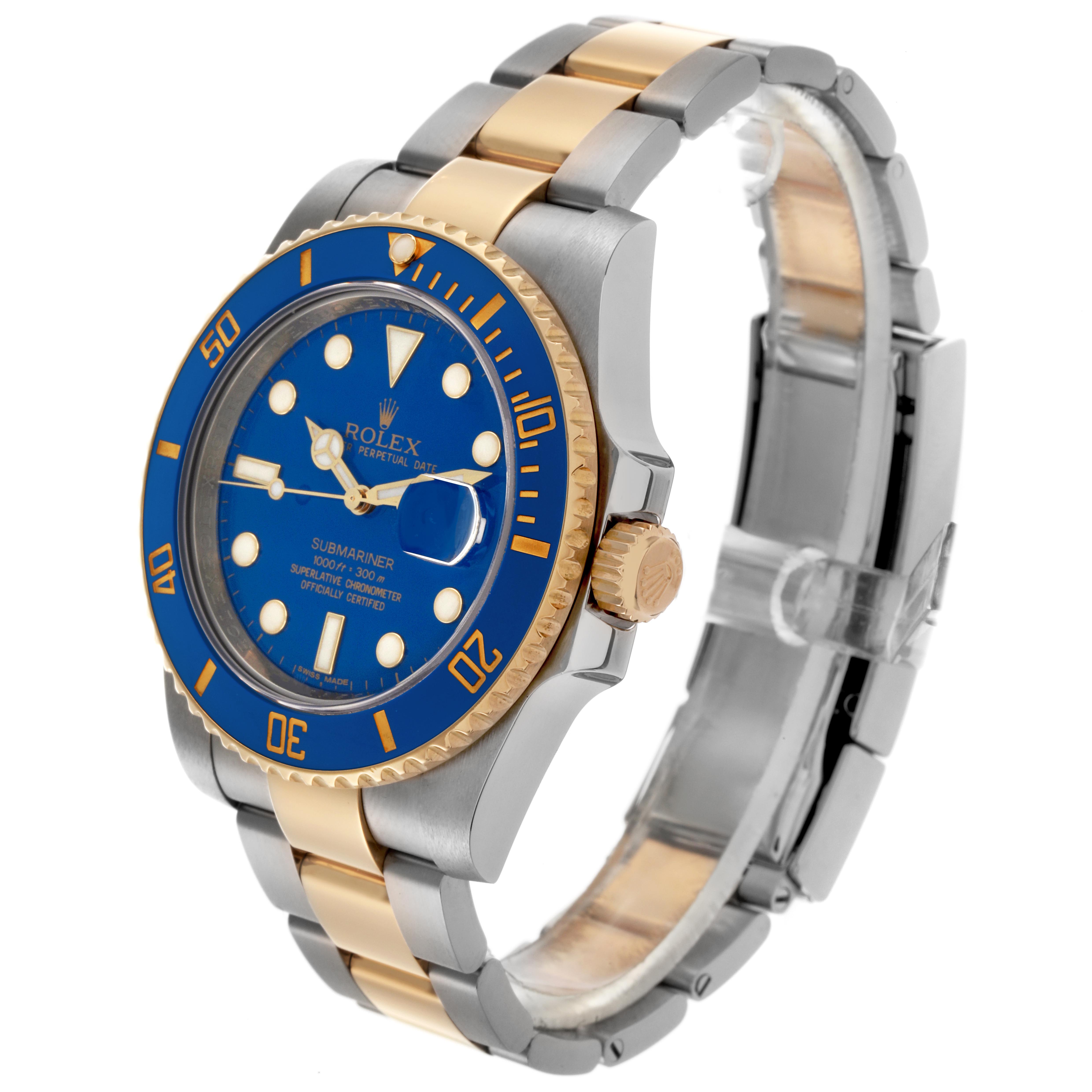 The Rolex Submariner 116613 Men
s Steel and Gold (two tone) Blue Dial 116613 Men
s Steel and Gold (two tone) Blue Dial watch is shown at a slight side angle, highlighting its bezel, crown, dial, and bracelet.