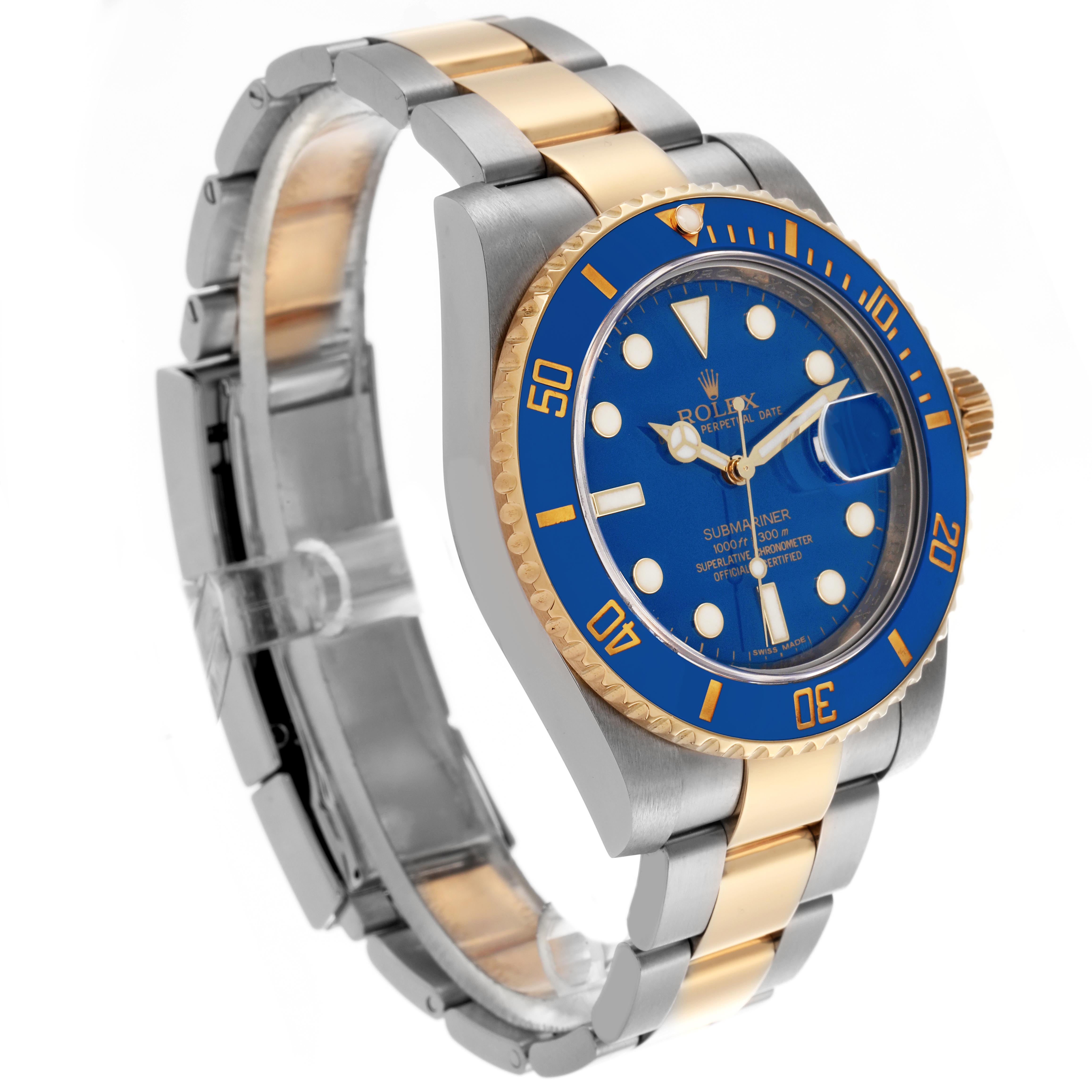 The Rolex Submariner 116613 Men
s Steel and Gold (two tone) Blue Dial 116613 Men
s Steel and Gold (two tone) Blue Dial is shown at a slight angle highlighting its blue dial, gold and silver bracelet, and bezel details.