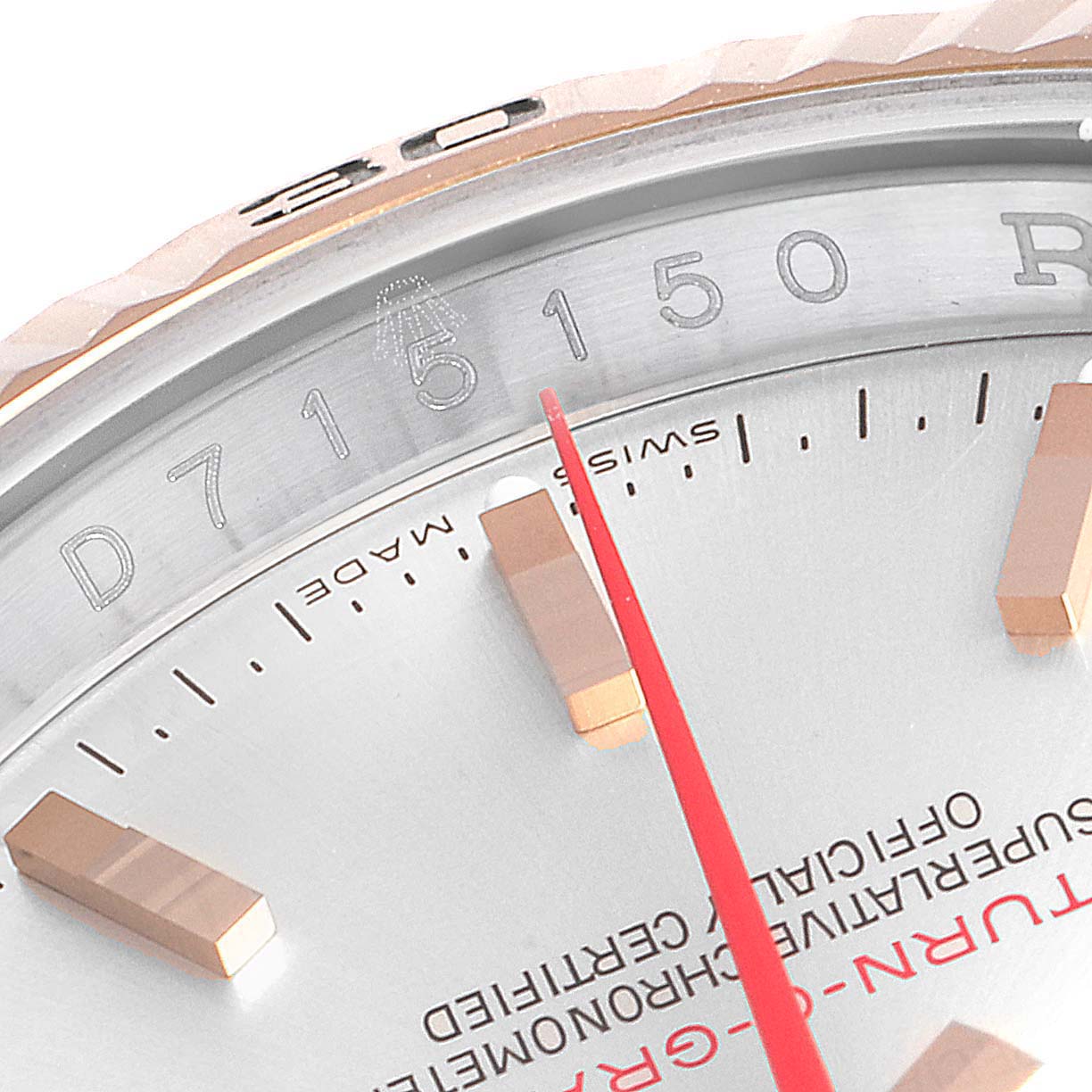 This close-up of the Rolex Turn-o-Graph 116261 Men
s Steel and Gold (two tone) Silver Dial 116261 Men
s Steel and Gold (two tone) Silver Dial model shows a portion of the dial, markers, and part of the bezel.