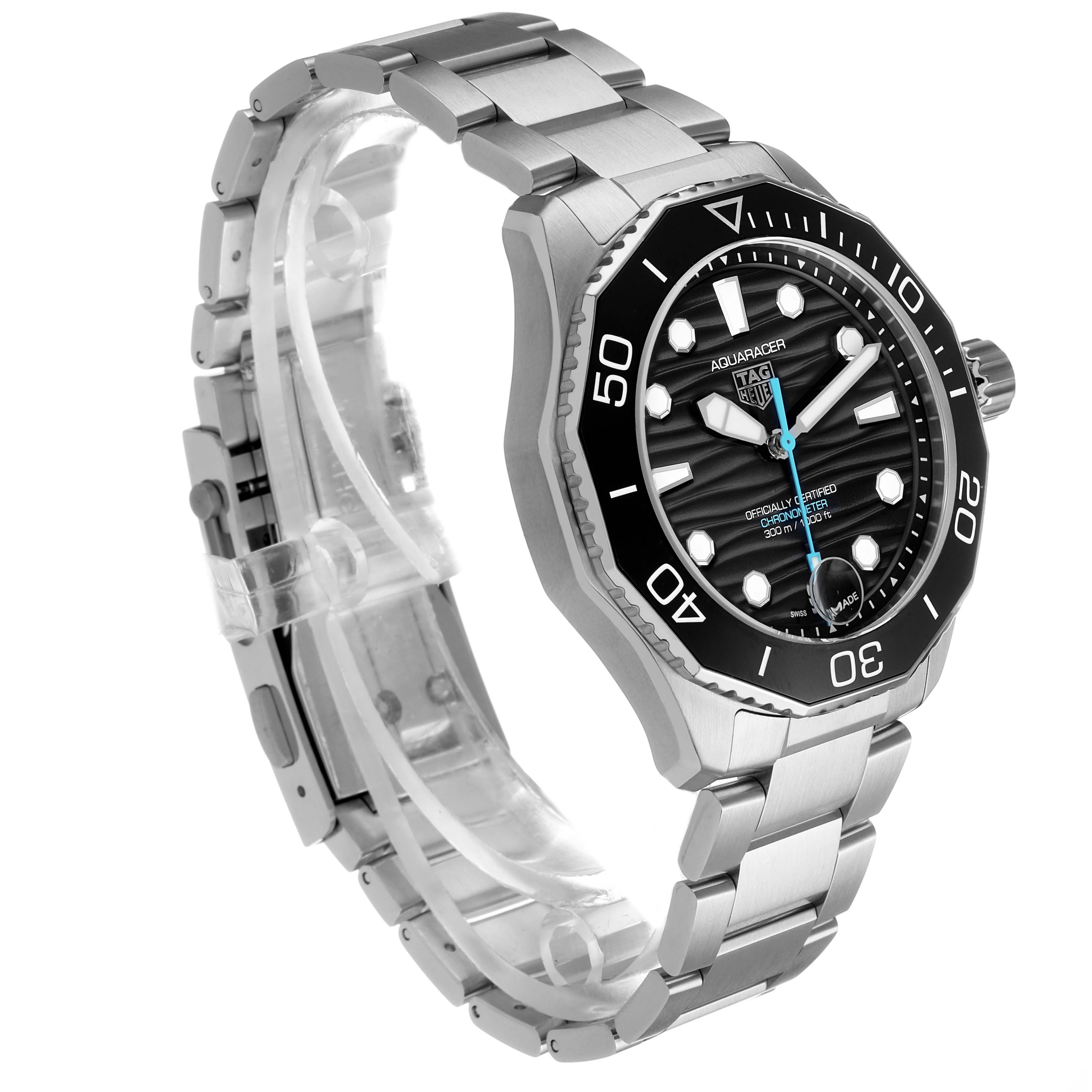 The Tag Heuer Aquaracer WBP5110.BA0013 Men's Stainless Steel Black Dial watch is shown at a three-quarter angle, highlighting the watch face, bezel, and bracelet.