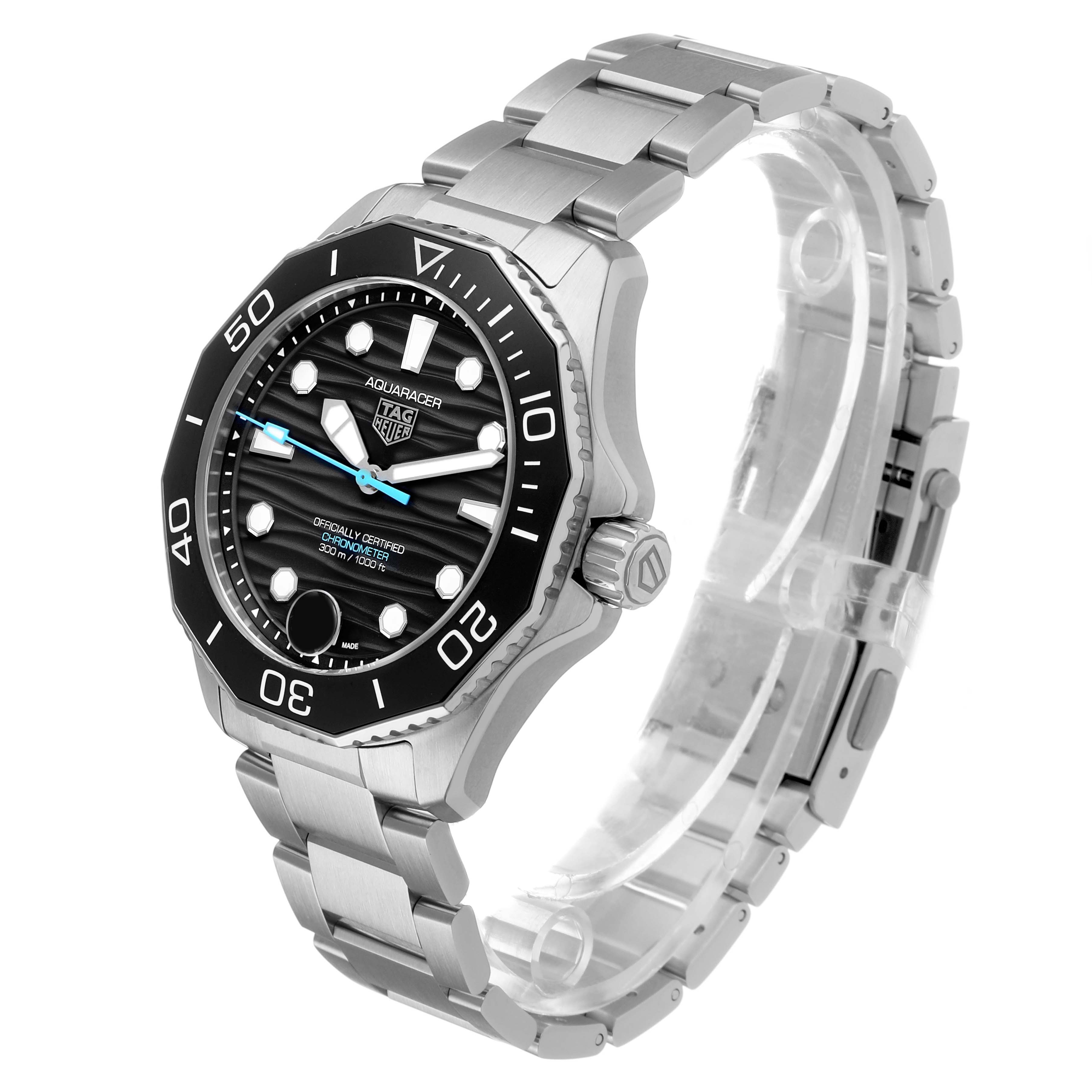 The Tag Heuer Aquaracer WBP5110.BA0013 Men's Stainless Steel Black Dial watch is shown at a three-quarter angle, highlighting the bezel, dial, and bracelet.