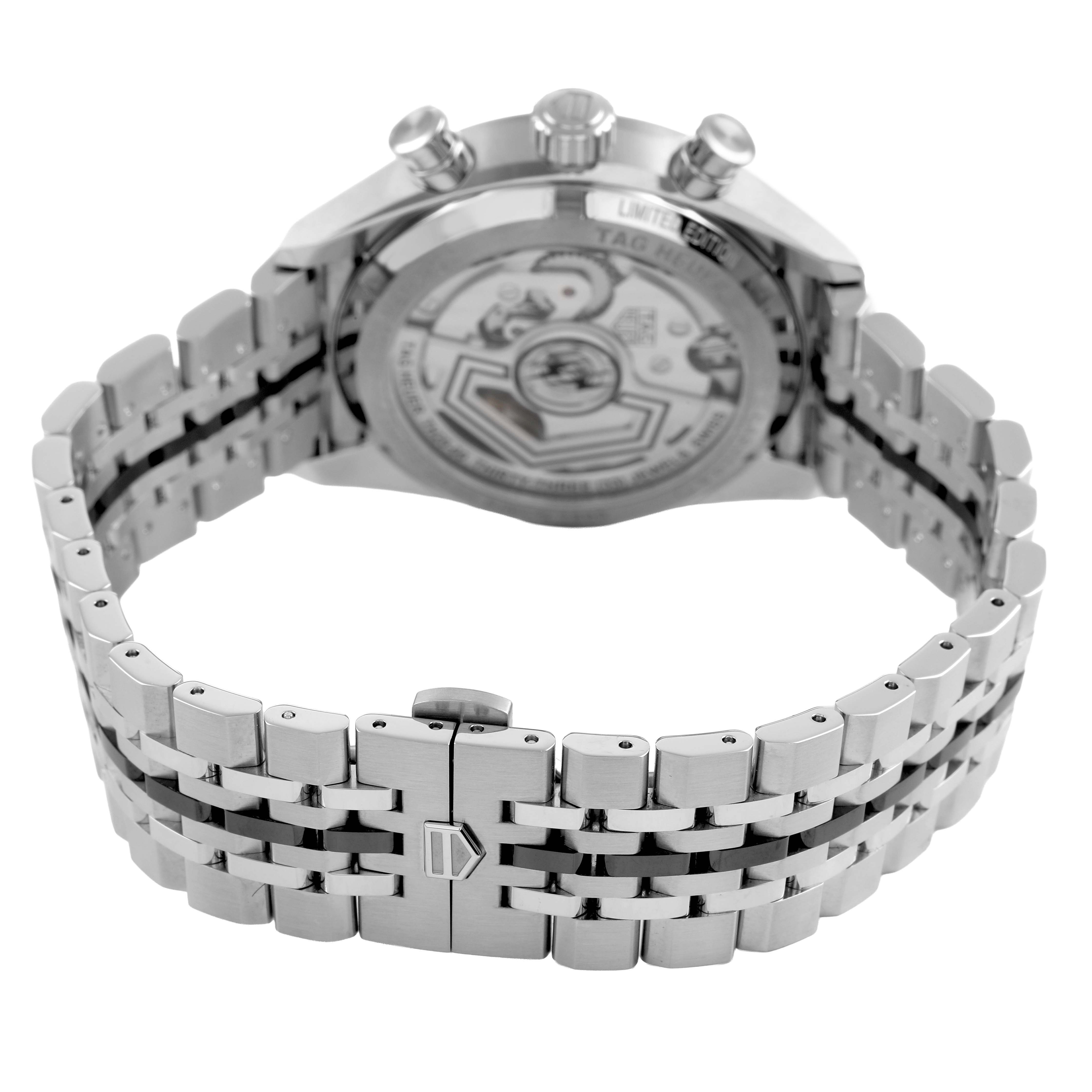 The image shows the back view of a Tag Heuer Carrera CBS221B.BA0045 Men's Stainless Steel Black Dial model, highlighting its stainless steel case, bracelet, and transparent back.
