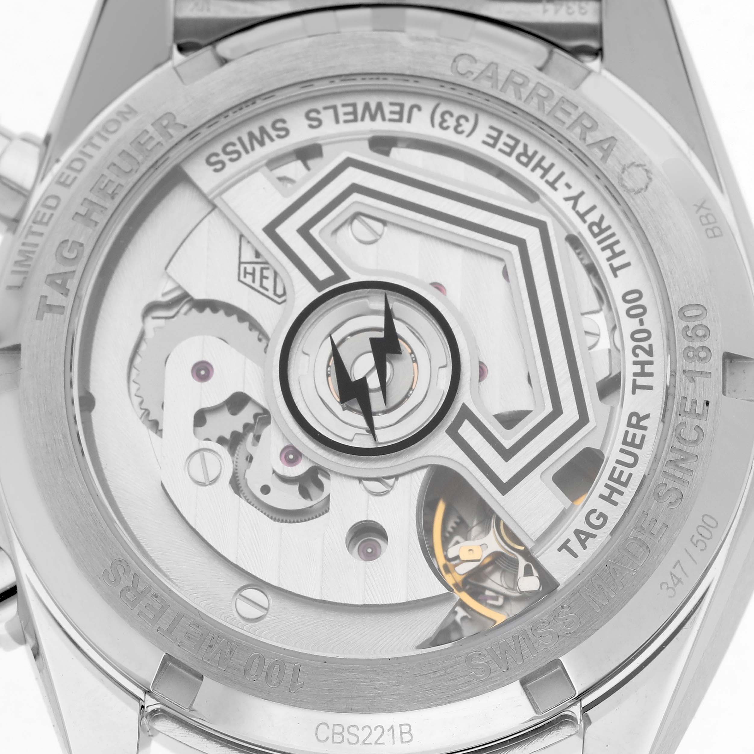 The image shows the back view of a Tag Heuer Carrera CBS221B.BA0045 Men's Stainless Steel Black Dial watch, highlighting the movement and transparent case back details.