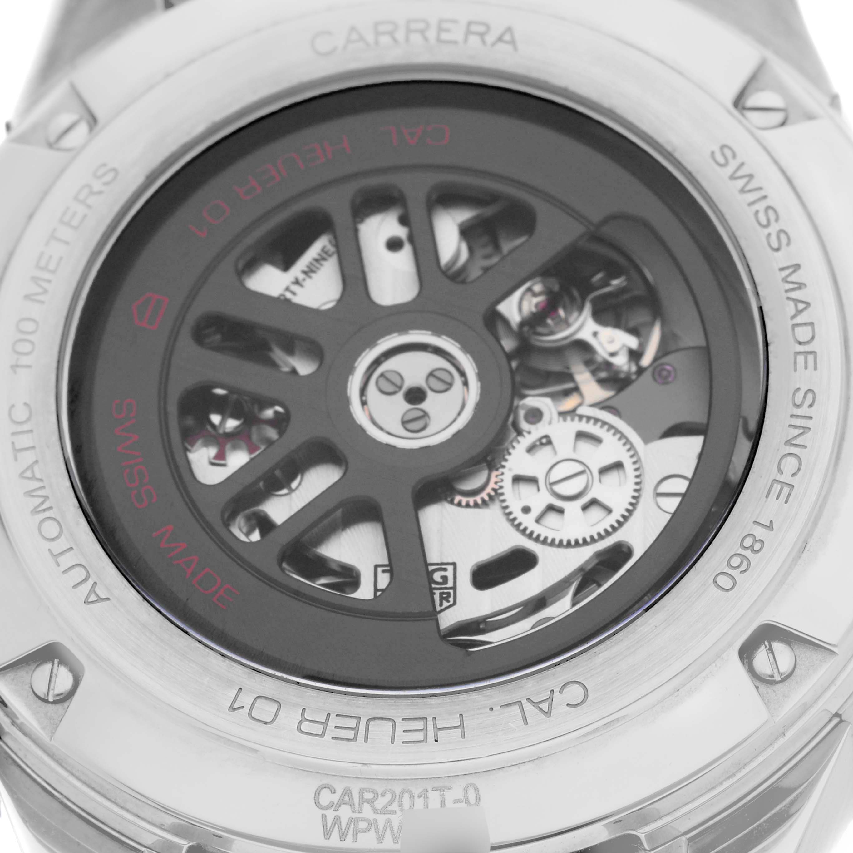 The image shows the back view of a Tag Heuer Carrera CAR201T Men's Stainless Steel Blue Dial CAR201T Men's Stainless Steel Blue Dial watch, highlighting the automatic movement and internal mechanisms.