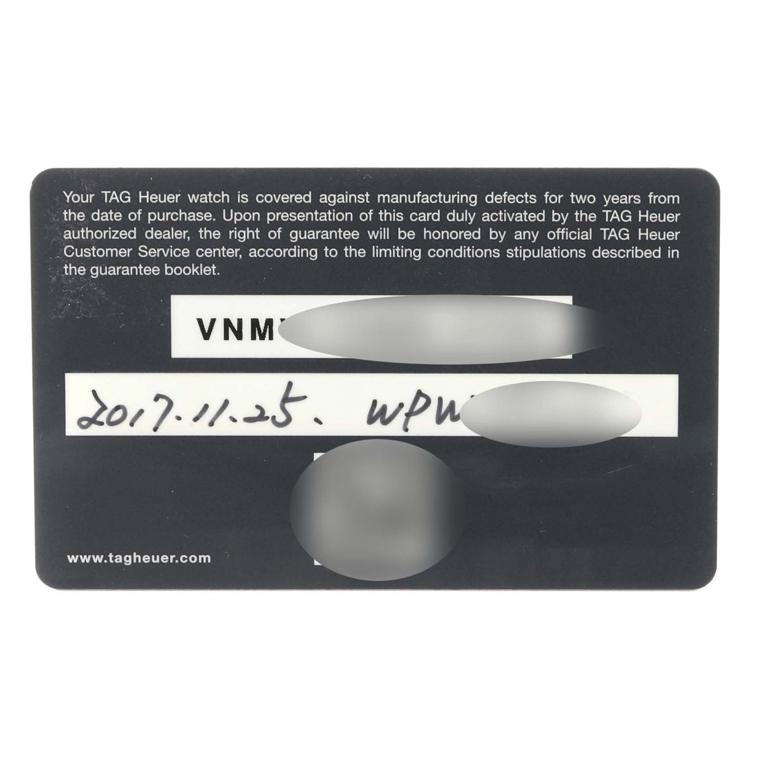 The image shows a warranty card for a Tag Heuer Carrera CAR201T Men's Stainless Steel Blue Dial CAR201T Men's Stainless Steel Blue Dial watch viewed from the top.