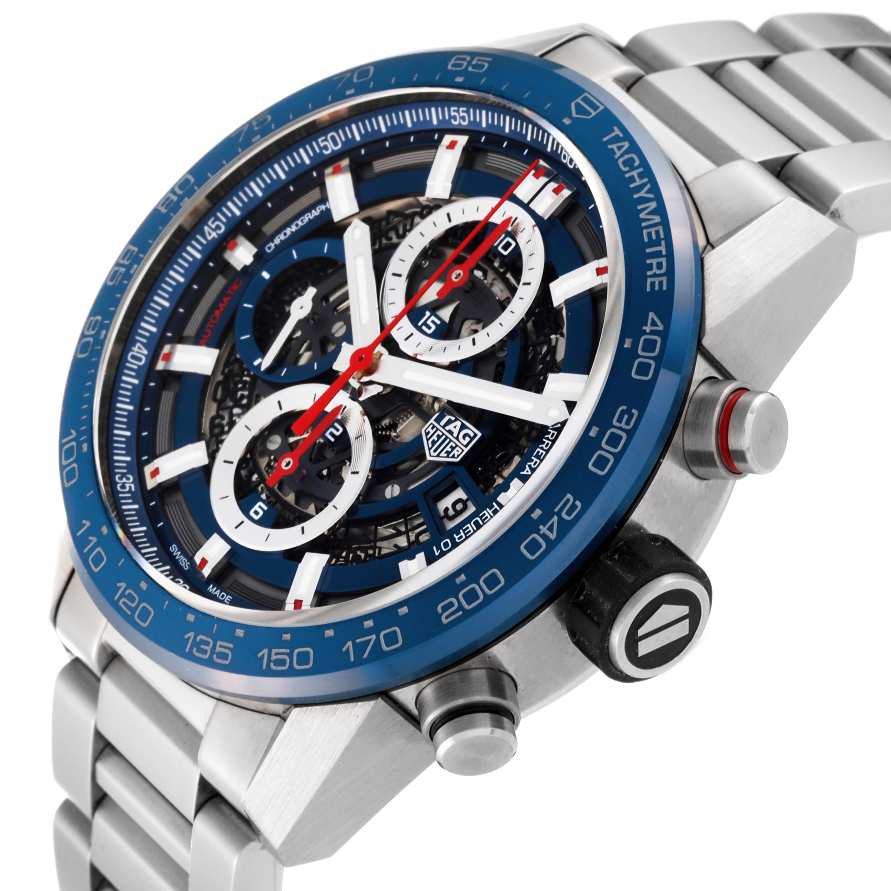 The image shows a side angle view of a Tag Heuer Carrera CAR201T Men's Stainless Steel Blue Dial CAR201T Men's Stainless Steel Blue Dial watch, highlighting its skeleton dial, blue tachymeter bezel, and metal bracelet.