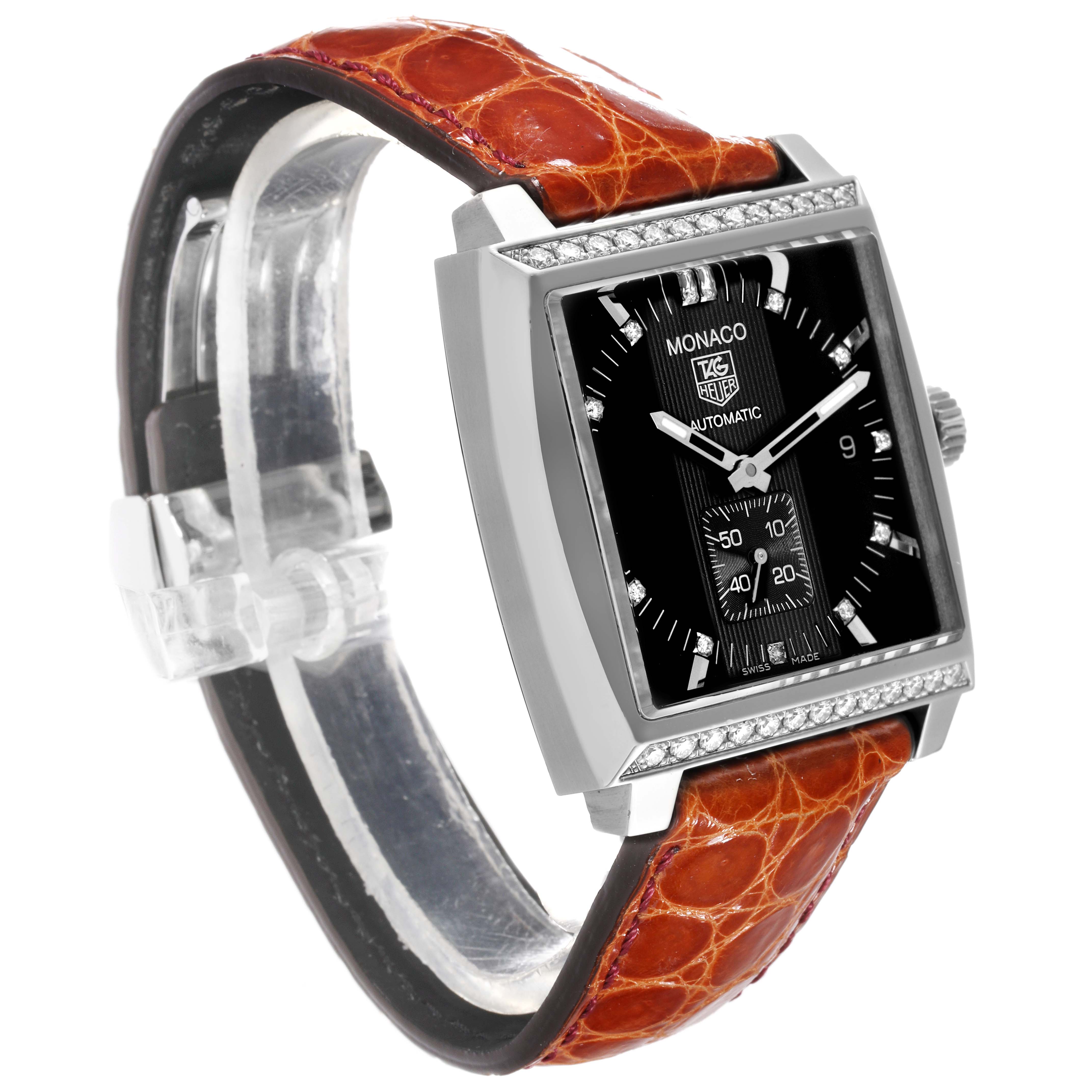 The Tag Heuer Monaco 63480 Men's Stainless Steel Black Dial 63480 Men's Stainless Steel Black Dial watch is shown at a three-quarter angle, displaying the face, case, crown, and brown leather strap.