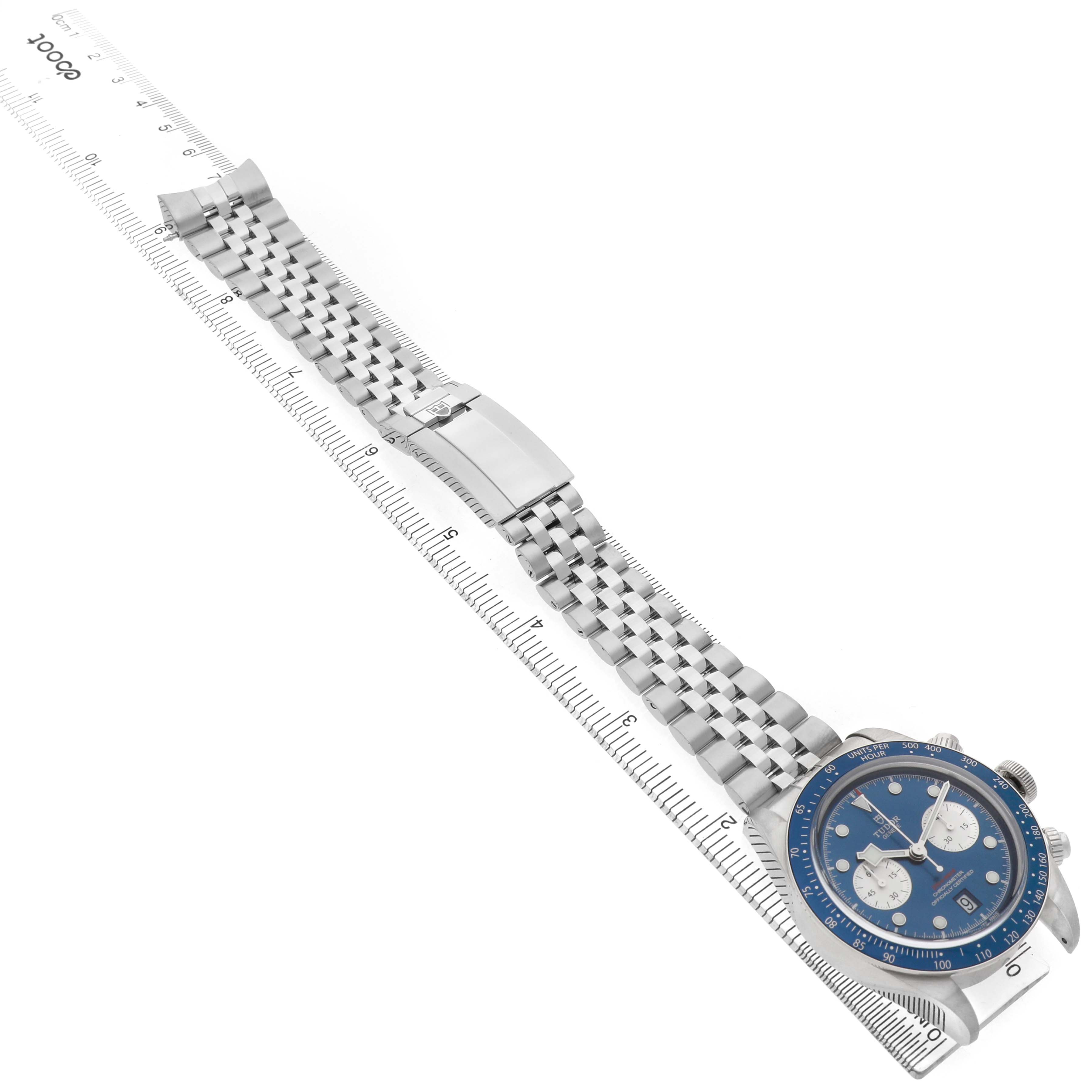 The Tudor Heritage Chrono M79360B-0002 Men's Stainless Steel Blue Dial watch is shown at a slight angle, displaying its face, case, and entire metal bracelet.