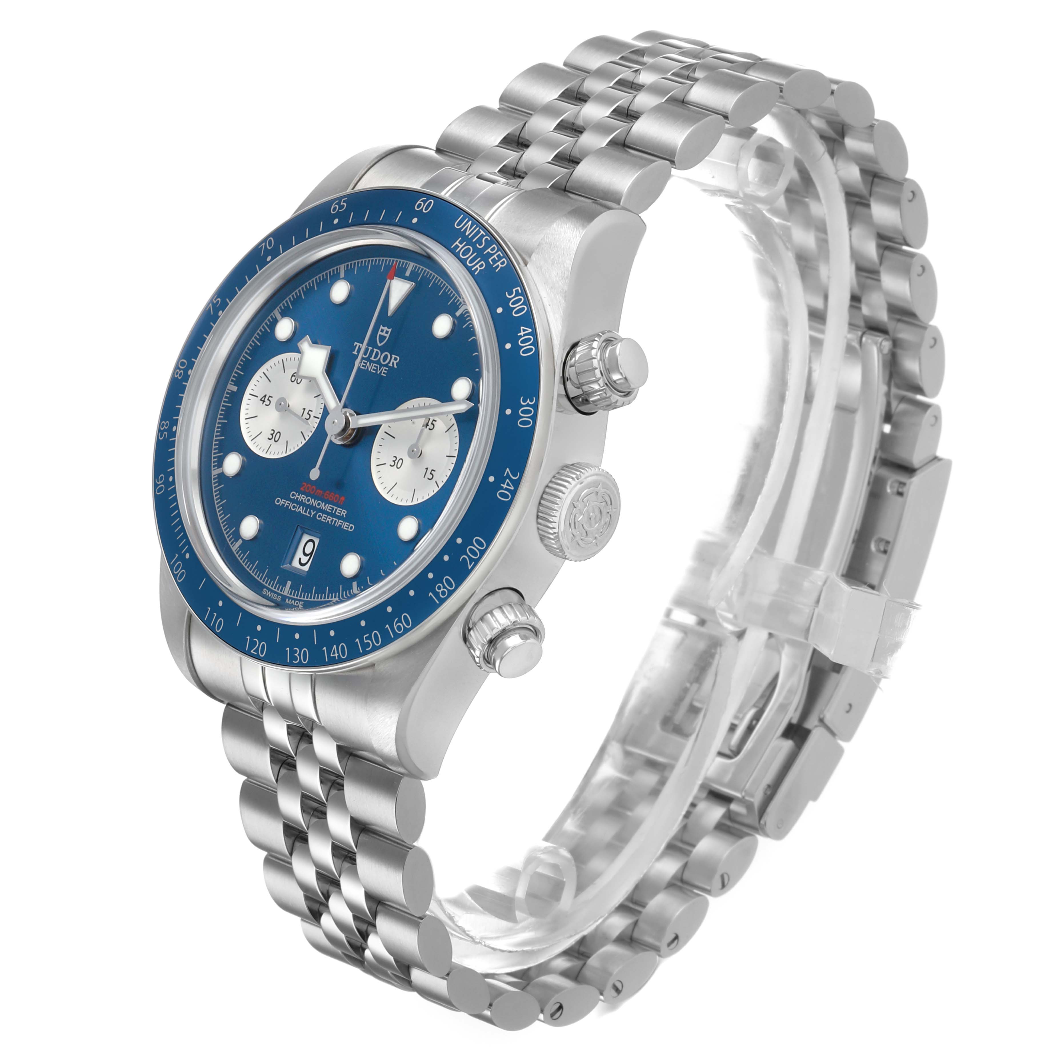 The Tudor Heritage Chrono M79360B-0002 Men's Stainless Steel Blue Dial watch is shown at a three-quarter angle, displaying the dial, crown, pushers, and bracelet.