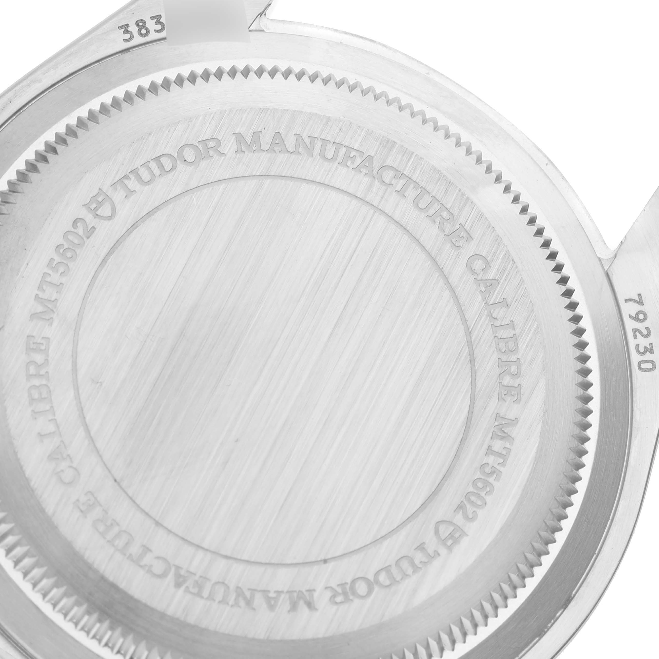 This is an angled close-up of the case back of a Tudor Heritage Black Bay 79230R Men's Stainless Steel Black Dial 79230R Men's Stainless Steel Black Dial watch, displaying the engraving and model details.