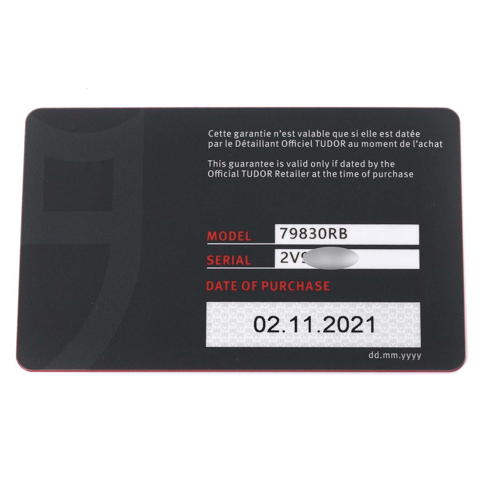 This is a warranty card for the Tudor Heritage Black Bay 79830RB Men's Stainless Steel Black Dial 79830RB Men's Stainless Steel Black Dial watch model 79830RB, showing the serial number and date of purchase.