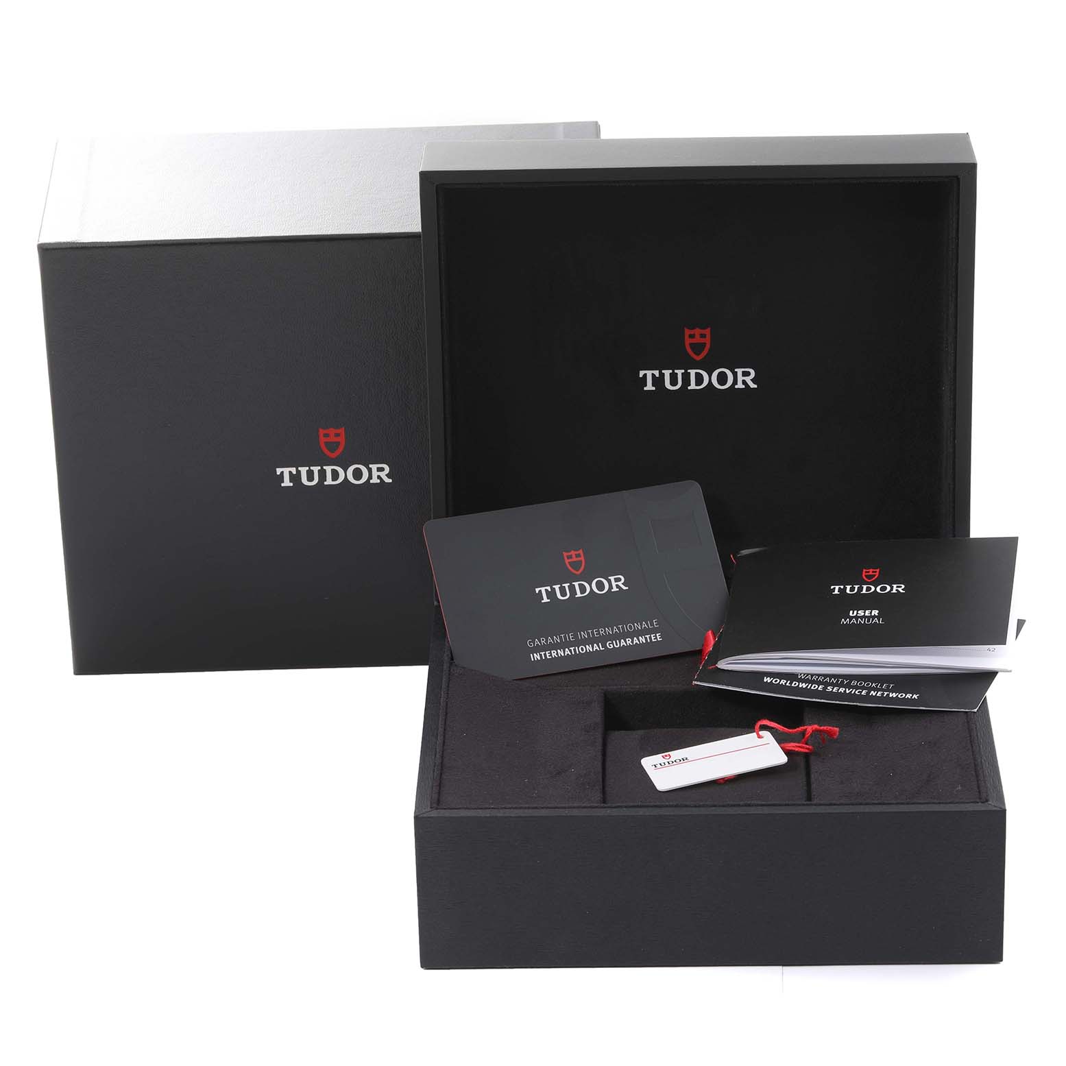 The image shows the Tudor Heritage Black Bay 79830RB Men's Stainless Steel Silver Dial 79830RB Men's Stainless Steel Silver Dial watch packaging, including the box, warranty card, user manual, and tag.